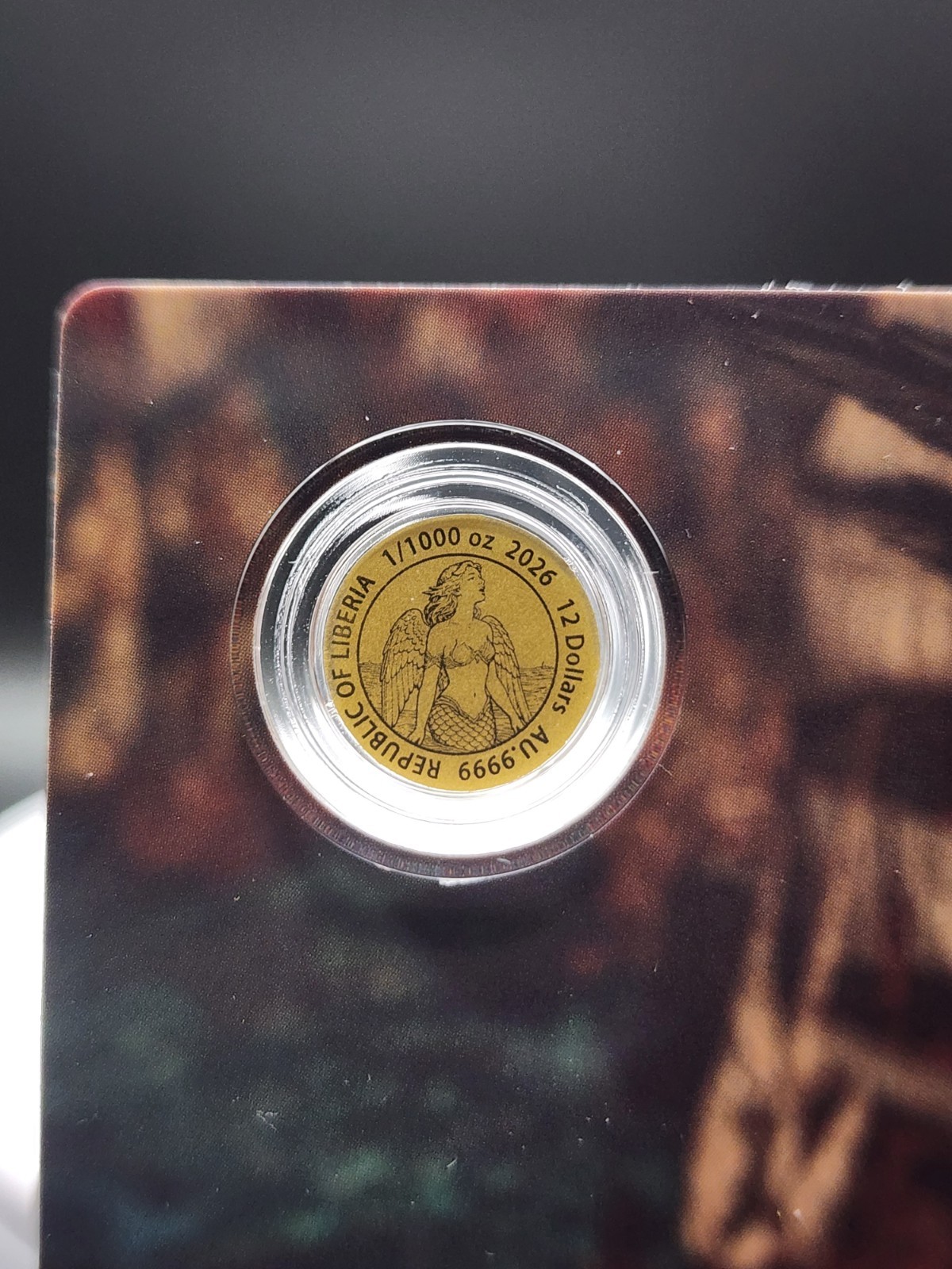 SIREN 1/1000 oz Fine Gold 12mm Coin in Capsule Card 12$ Republic of Liberia 2026