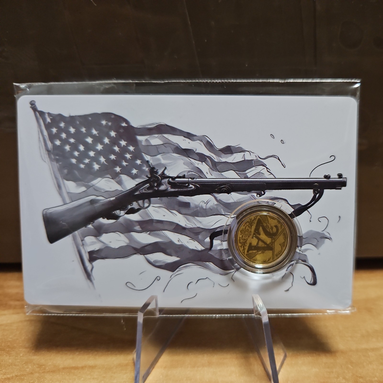 999 Fine Gold Round 1/1000 oz American Flag & Rifle Design