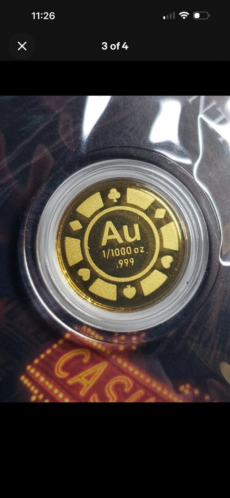 Roulette 1/1000 oz Gold Round In Card. Mintage 10,000