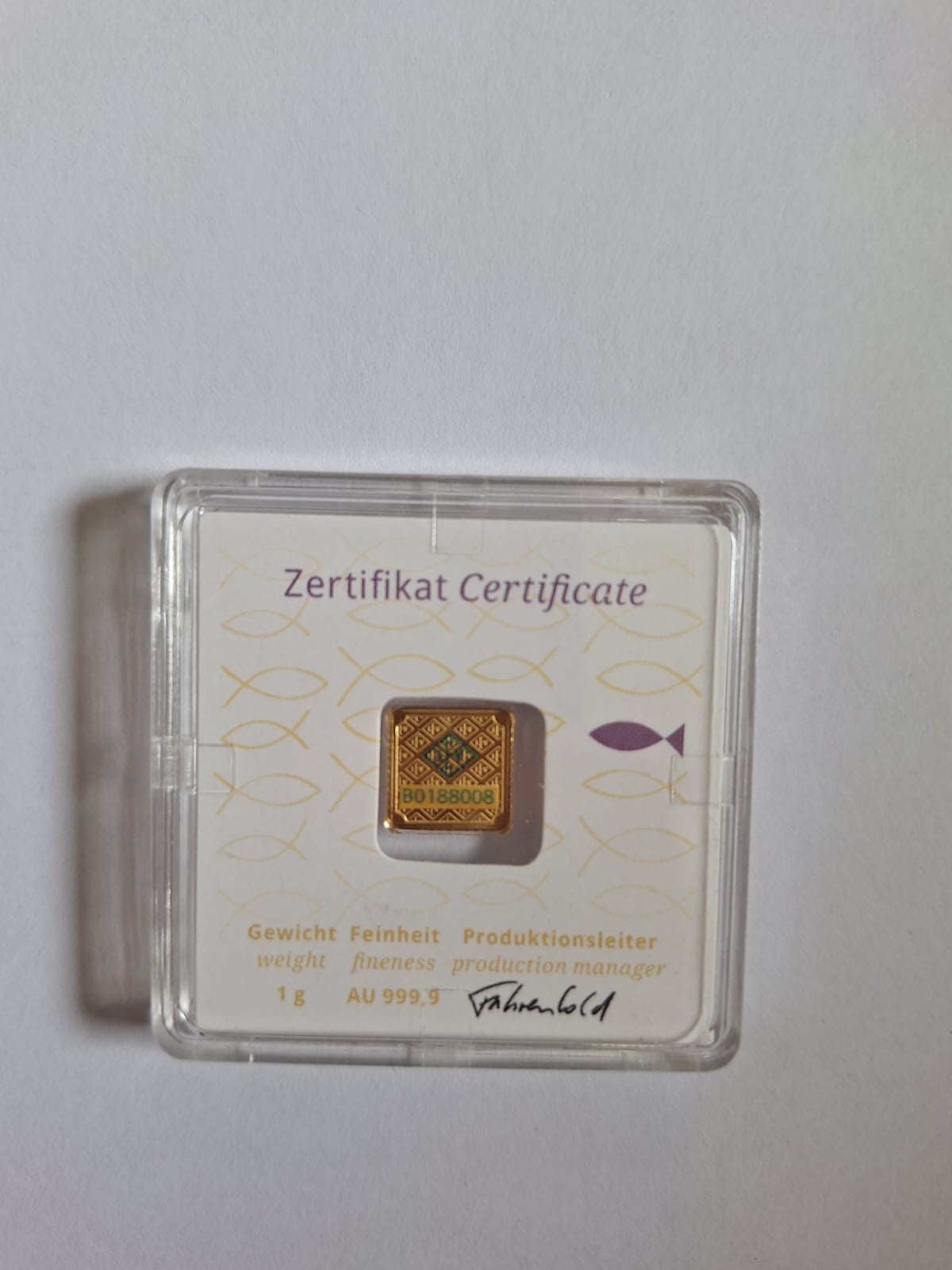 Geiger Edelmetalle 1g Gold Bar Purple Fish – Square Design in Assay