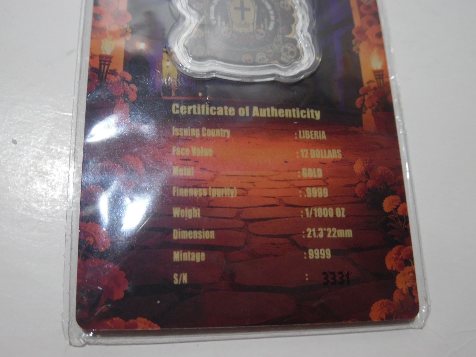 2026 Liberia 1/1000th Gold Carded Dia De Los Muertos Special Shaped with Capsule