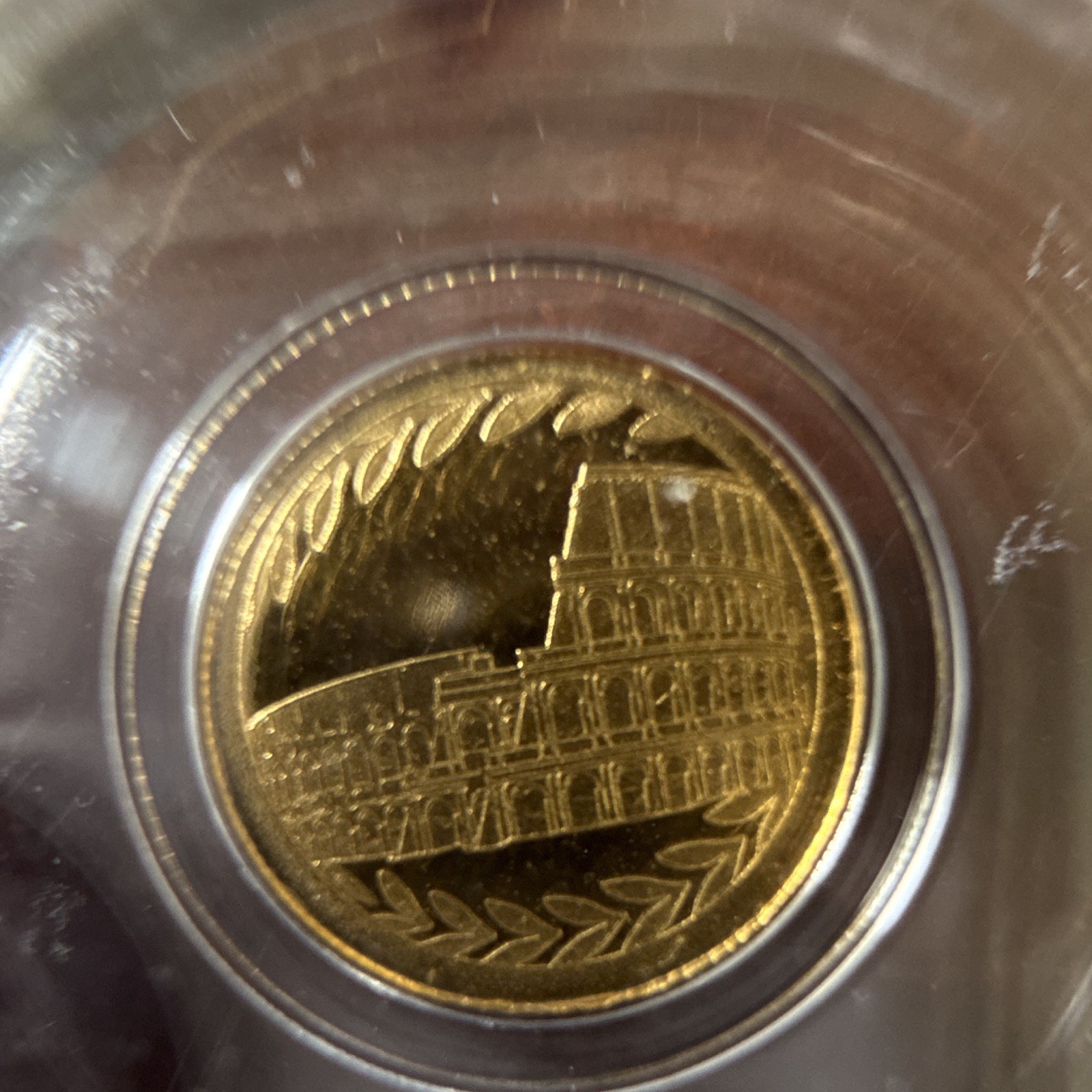 PCGS MS69 Colosseum ND 1/200 oz Gold Round Total Gold Content