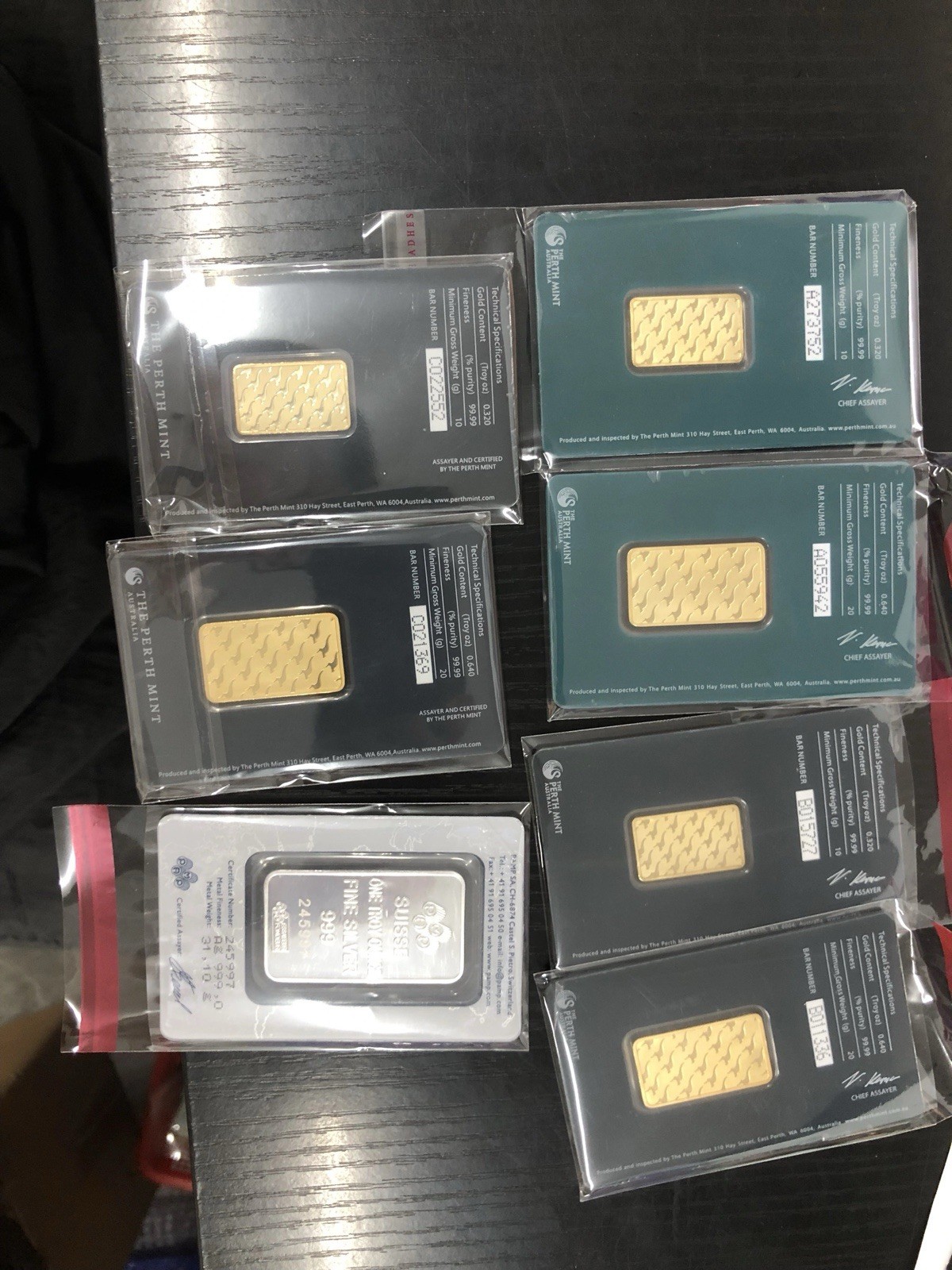 Pamp & Perth Minted Golden And Silver Bullion Bars.