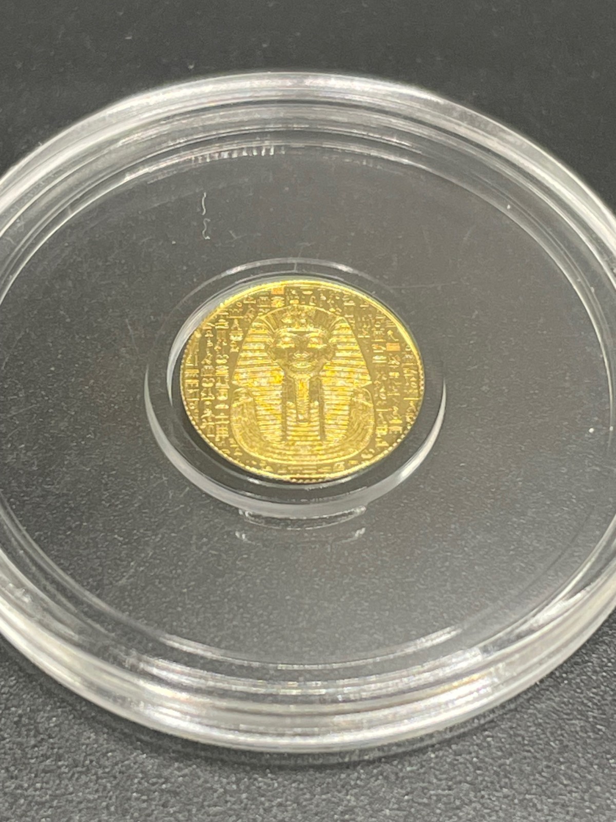 1/200th monarch Egyptian King Tut gold round in capsule