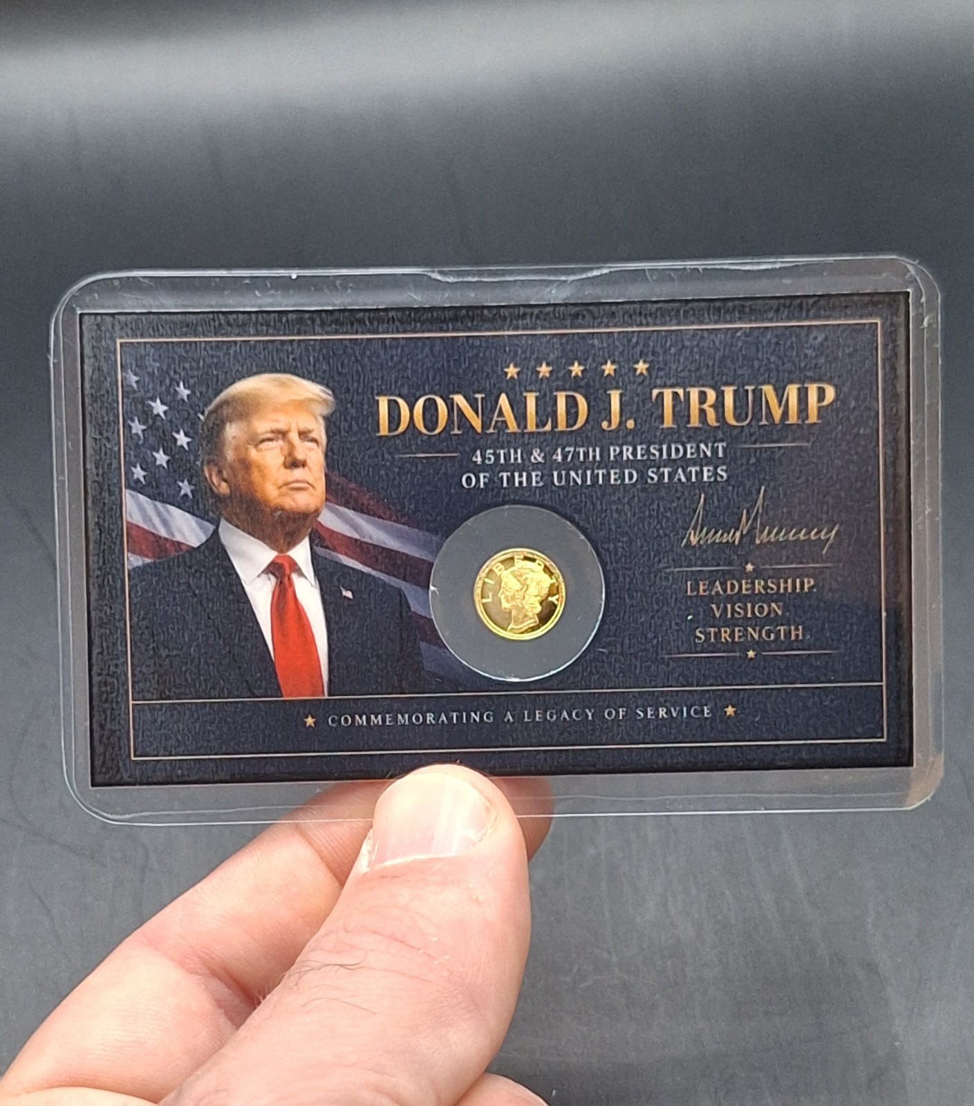 Donald Trump Laminated Tribute Card w/ 1/100 oz .9999 Pure Gold Mercury Round