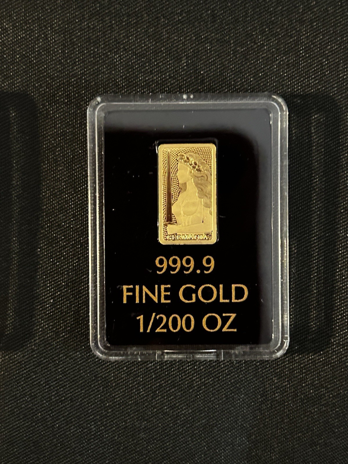 Lot of 2, 1/200th oz Germania Mint Gold In Capsules