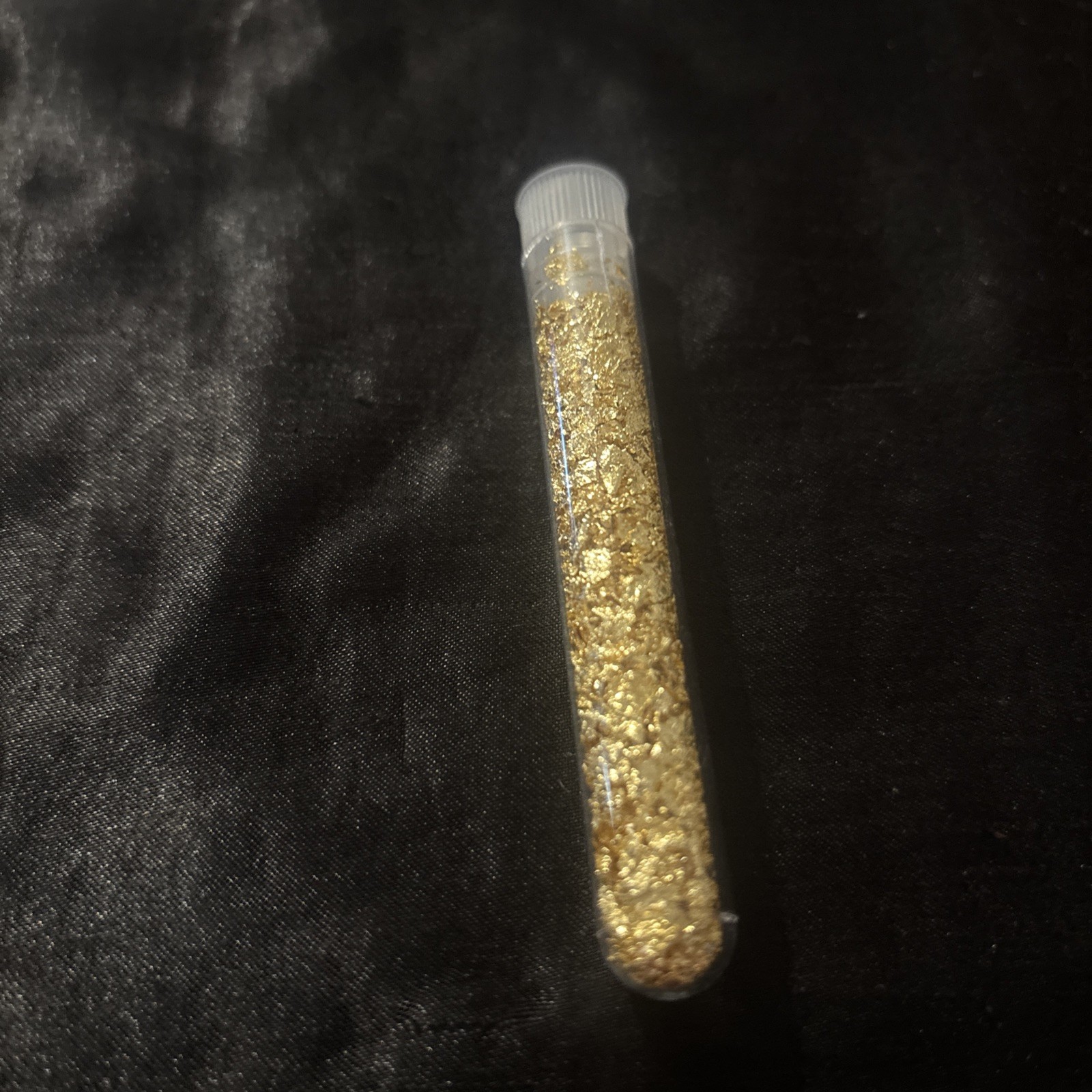 Gold rounds lot with slabs and vial with 1/4 goldback