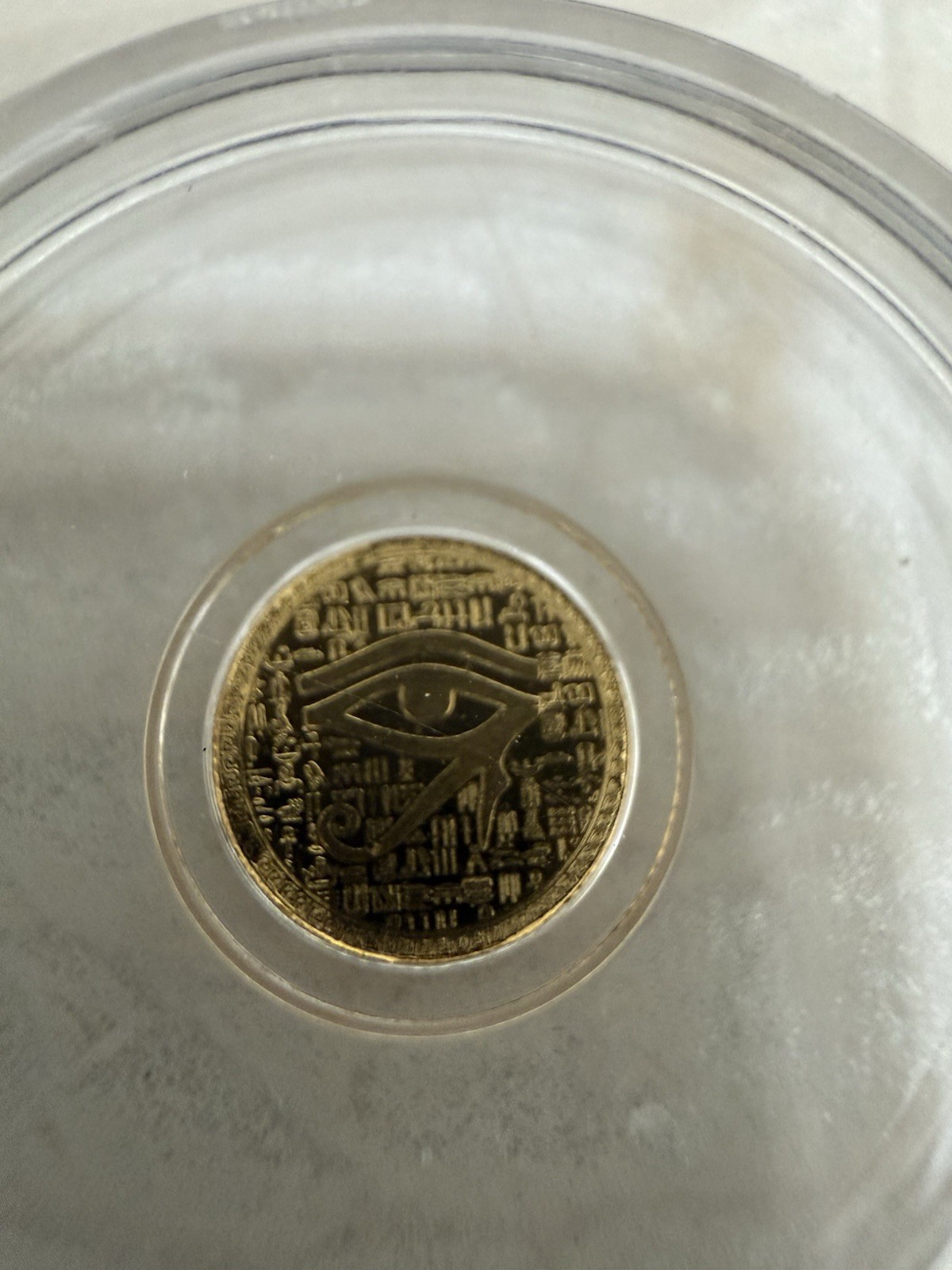 Beautiful 1/500 oz Monarch Egyptian Eye of Ra .9999 Fine Gold Round BU Capsule