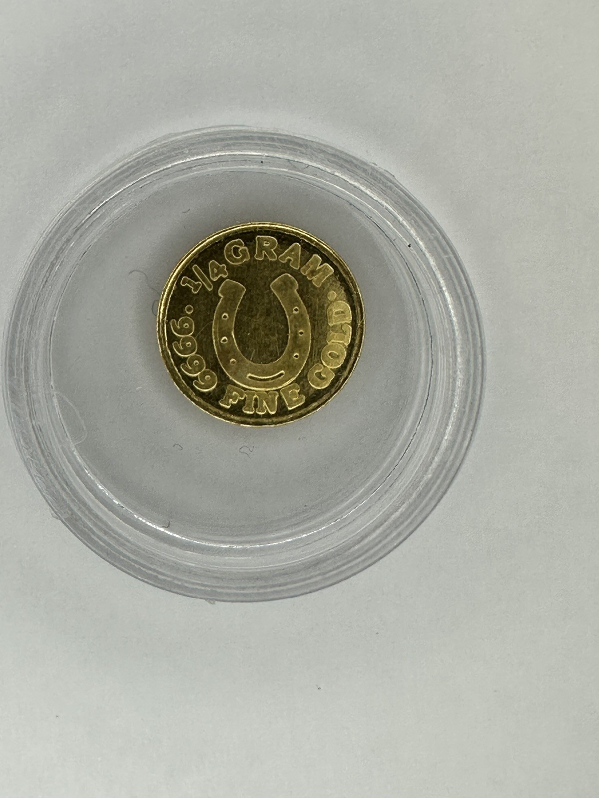 1/4 Gram .9999 PURE FINE GOLD Round In Capsule – Monarch Metals Lucky Horseshoe