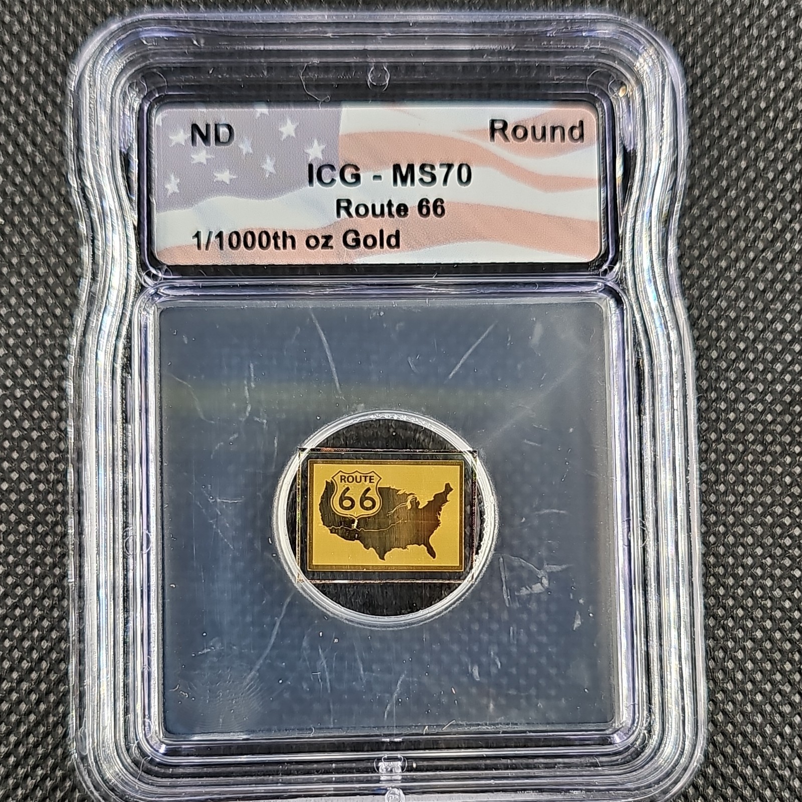 Route 66 Gold Bar 1/1000 oz Gold ICG MS 70