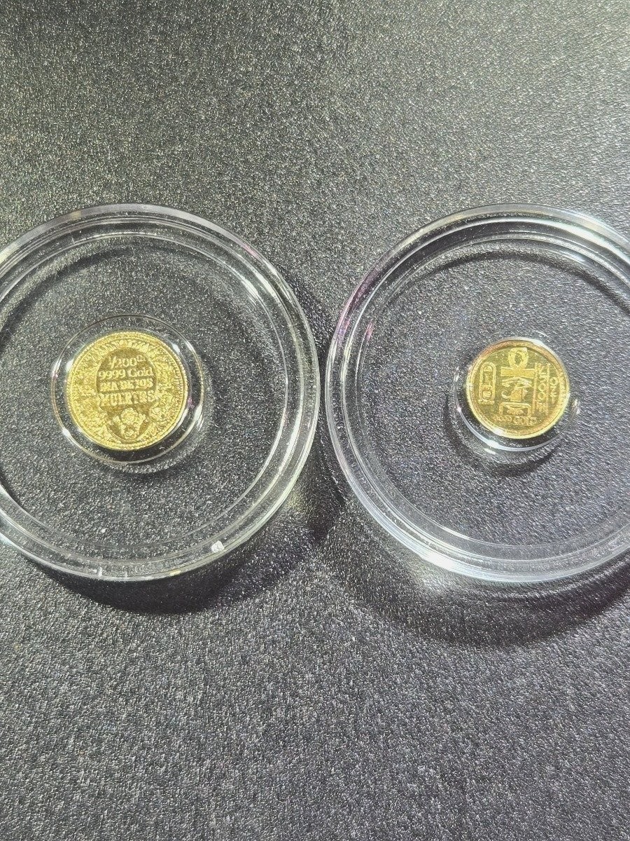 2 Fractional Gold Rounds: 1/200 oz Dia de los Muertos & 1/500 oz Eye of Horus