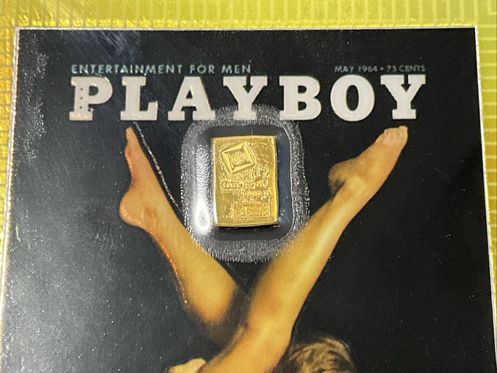 1 gram Gold CombiBar™ Valcambi Suisse .9999 Fine Gold Bar On Playboy Cover Card