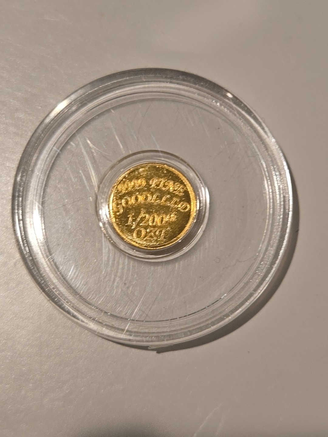 The Coin Shack 1/200th oz .9999 Fine Gold Round In Plastic Capsule