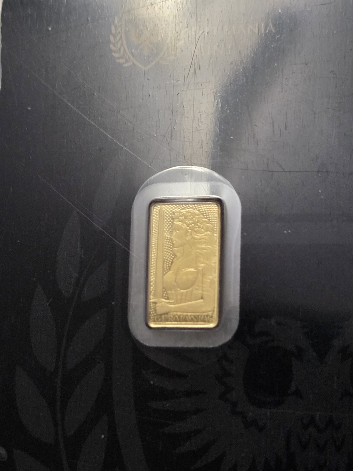Germania Mint 1/100 Gold Lady Germania Stamped Proof Bar in Card
