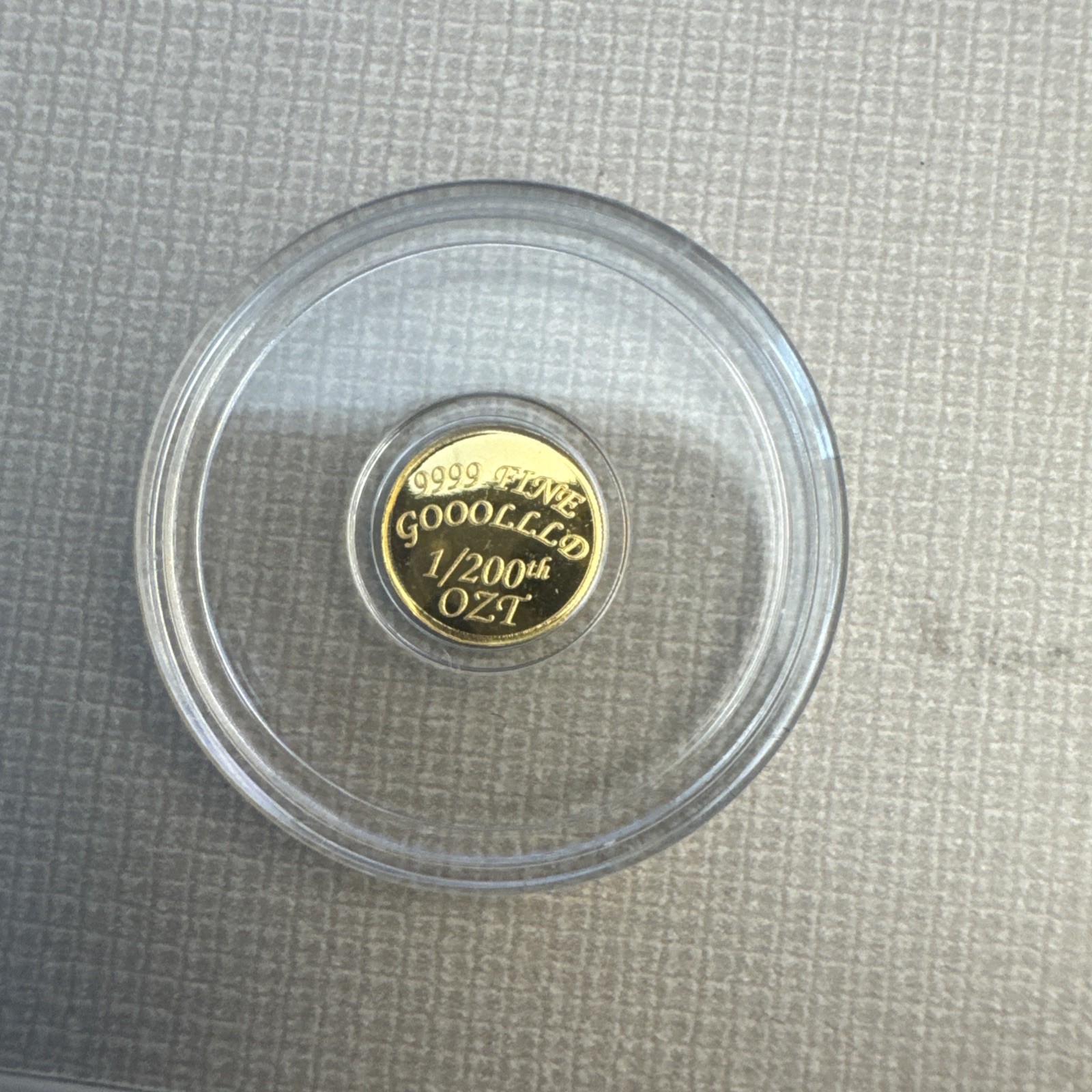 The Coin Shack 1/200th oz .9999 Fine Gold Round In Plastic Capsule