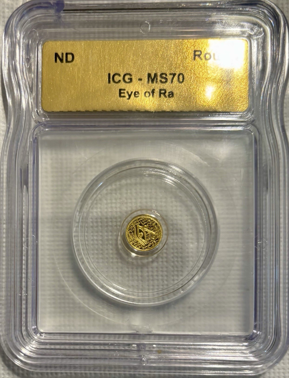 ICG MS70 Eye of Ra Gold Round 1/500th oz Gold Total Content 1/500th oz