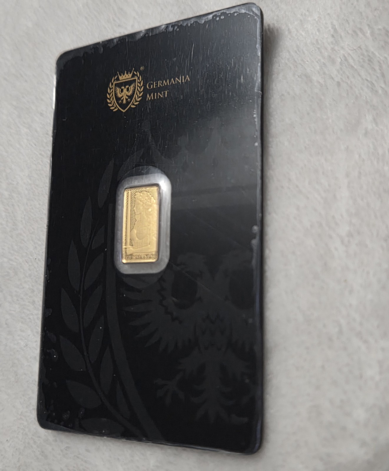 Germania Mint 1/100 Gold Lady Germania Stamped Proof Bar in Card
