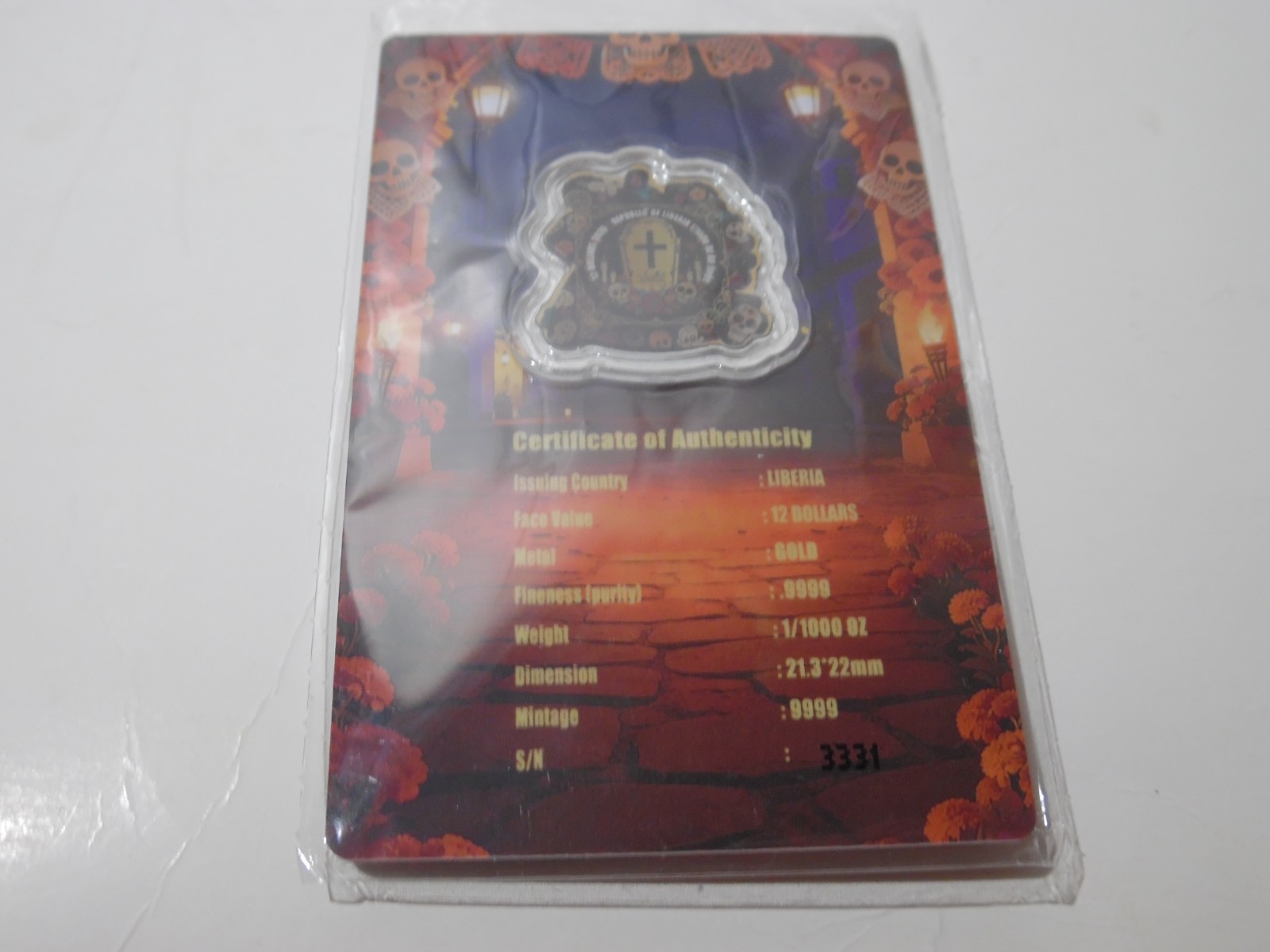 2026 Liberia 1/1000th Gold Carded Dia De Los Muertos Special Shaped with Capsule