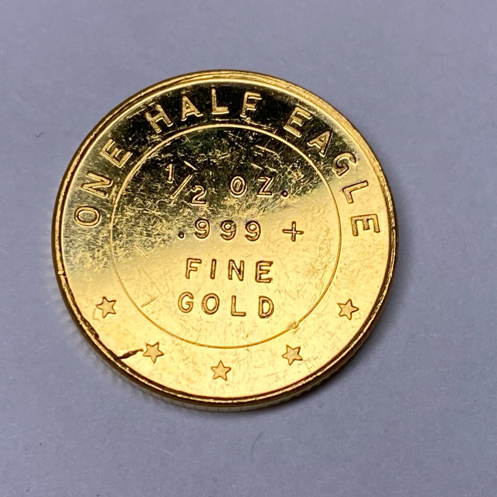 AMERICAN EAGLE WHITLEY MINT 1/2 OZ EAGLE .999 FINE GOLD ROUND