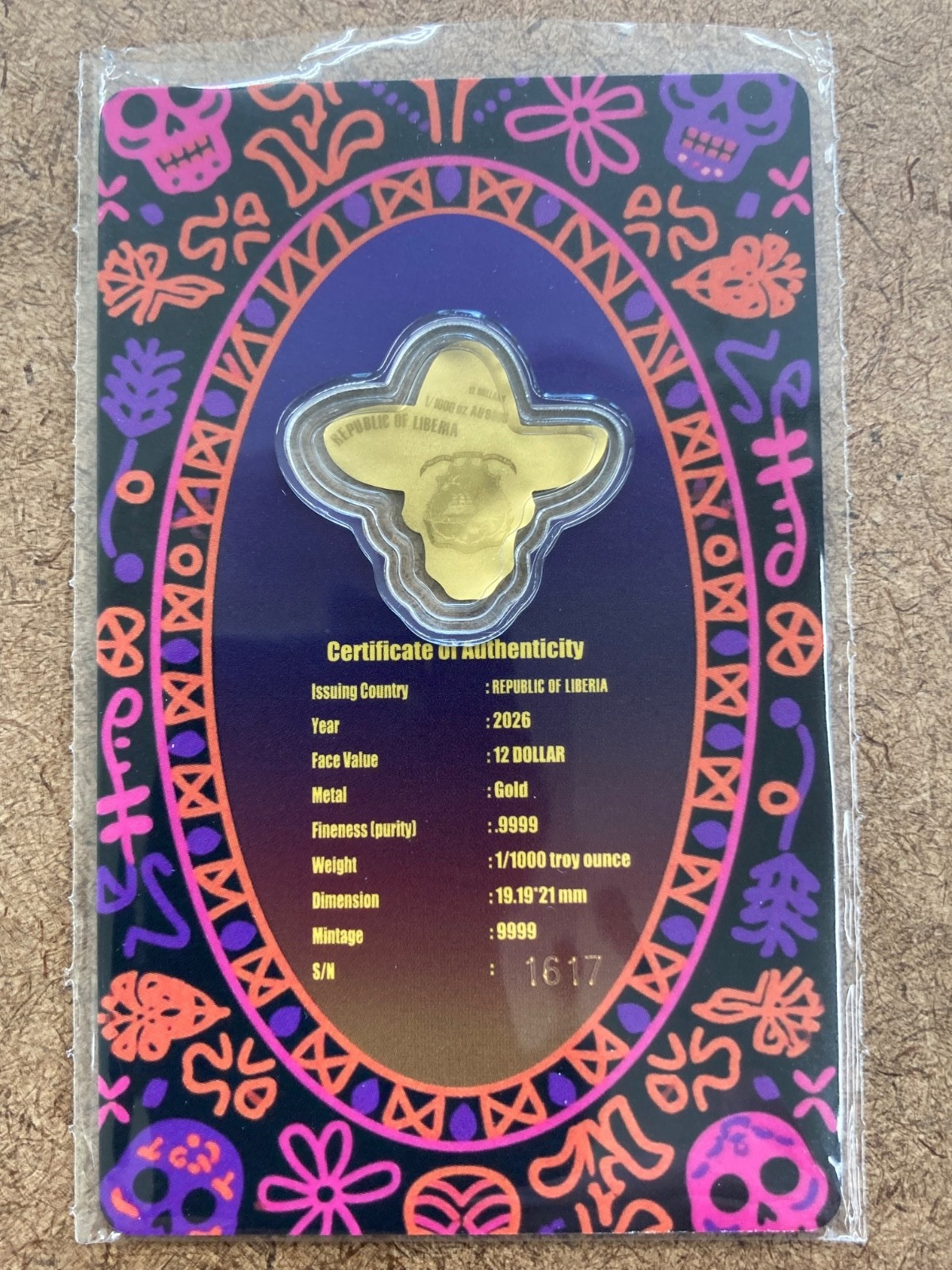 2026 Liberia 1/1000th Gold Carded Dia De Los Muertos Special Shaped with Capsule