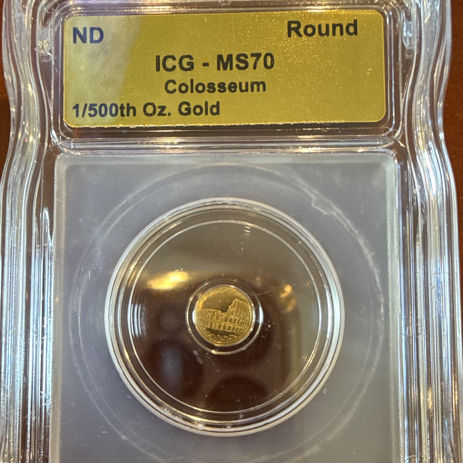 ICG MS70 Colosseum ND 1/500th oz Gold Round Total Gold Content