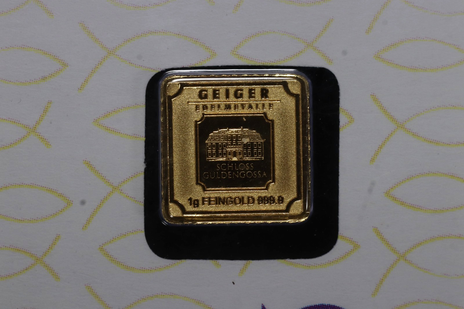 Geiger Edelmetalle 1g Gold Bar Purple Fish – Square Design in Assay