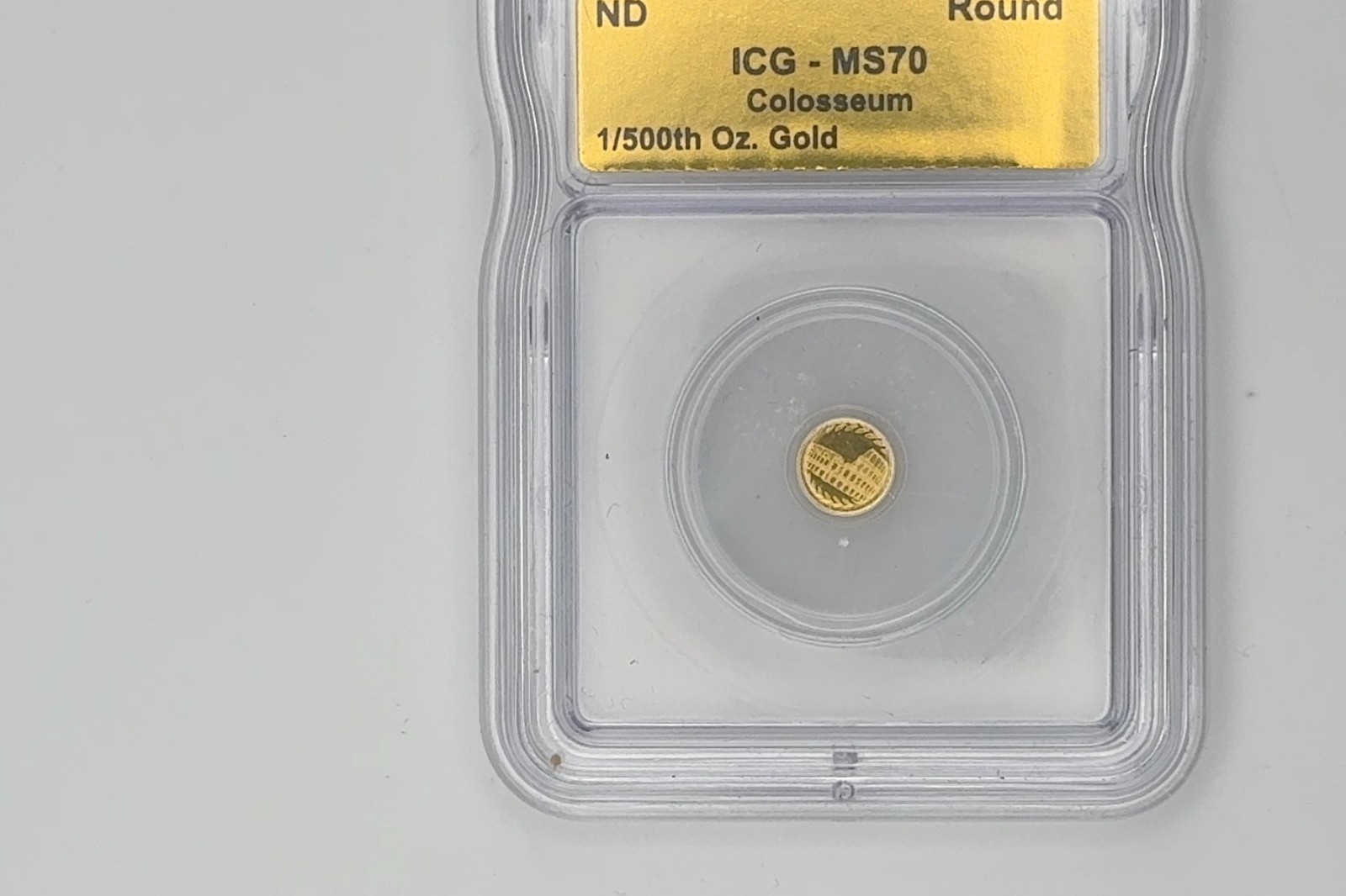 ICG MS70 Colosseum Gold Round 1/500th oz Gold Composition 1/500th oz