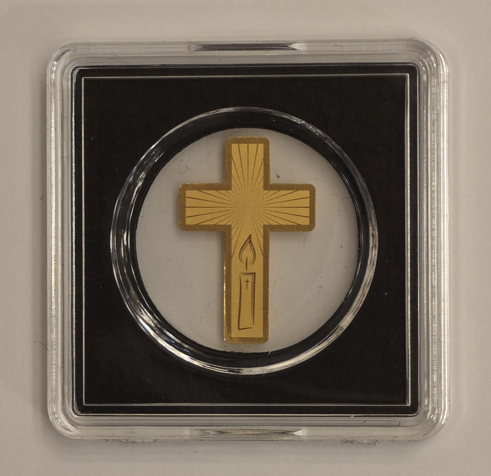 2025 FINE GOLD 1/1000oz CROSS WITH CANDLE/FLAME FROM THE REPUBLIC OF CHAD