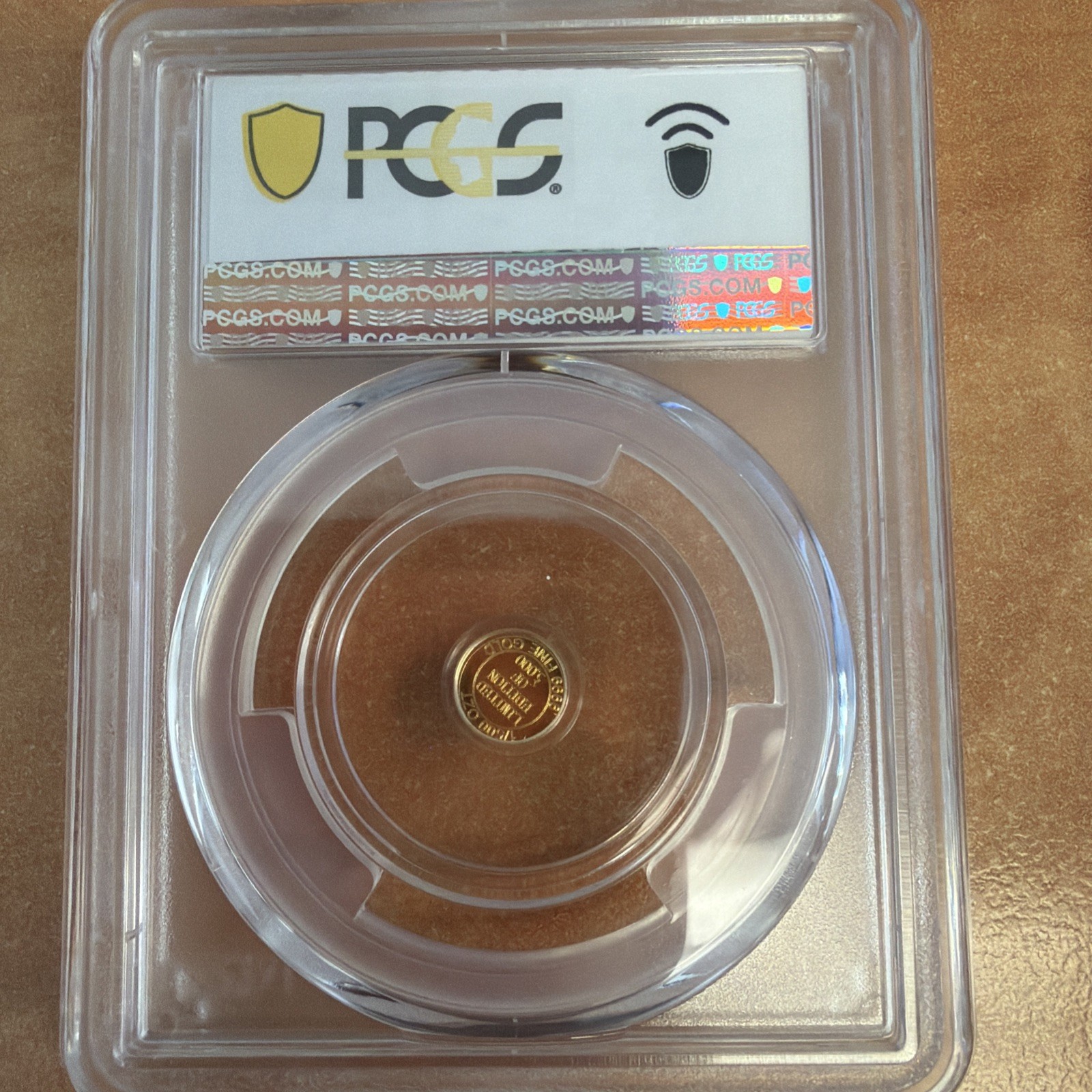 cowboy Au 1/500th oz Gold Round – Gold Composition – PCGS MS69 PCGS