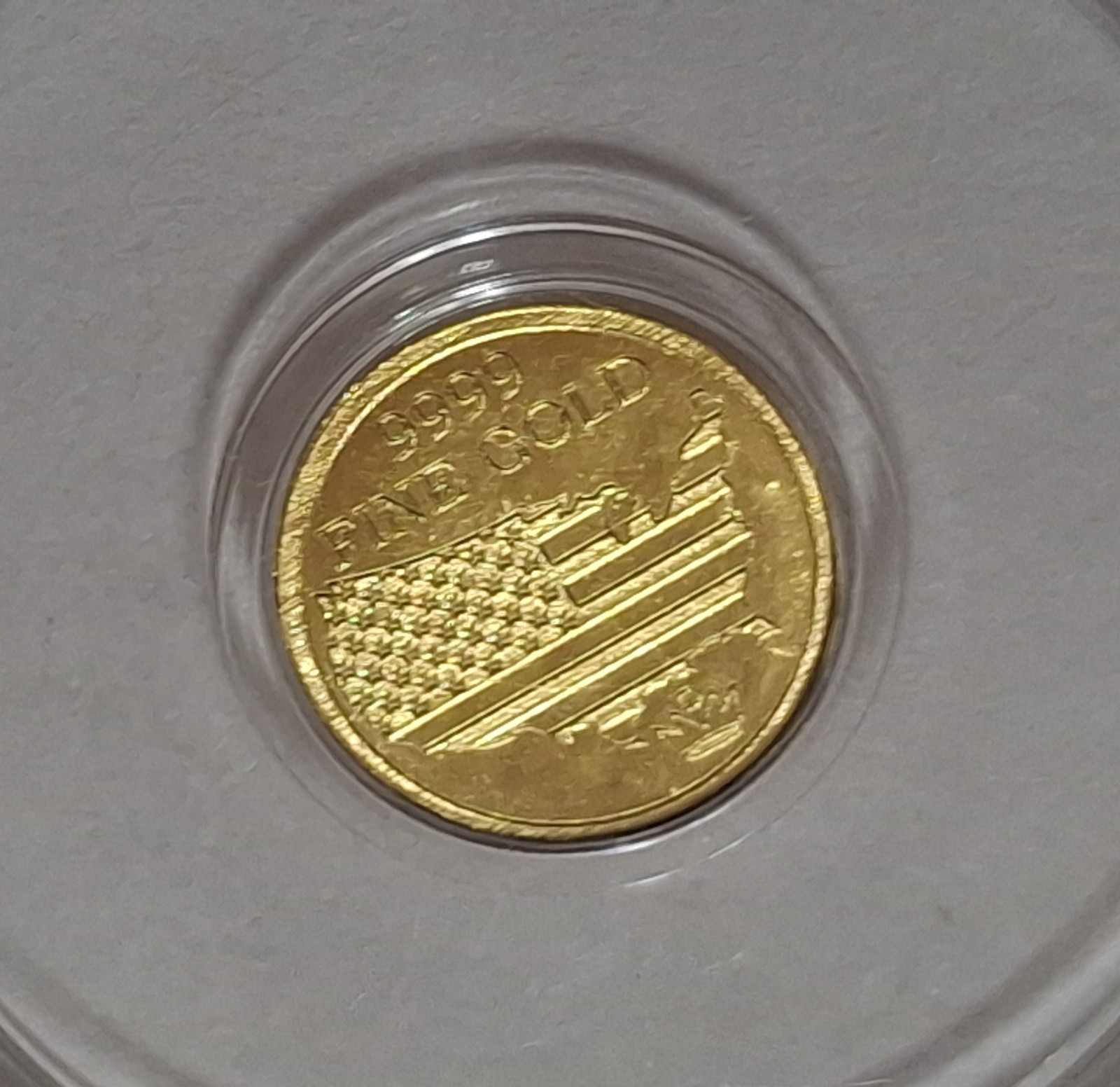 Monarch Metals 1/200oz Gold Tactical Skeleton In Capsule