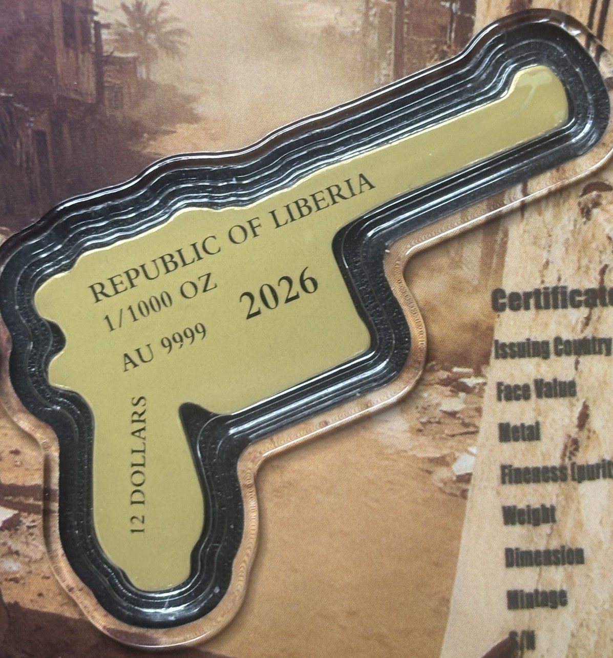 1/1000 oz Gold Mauser C96 Gun Shaped 2026 Liberia .9999 Gold Coin in Card