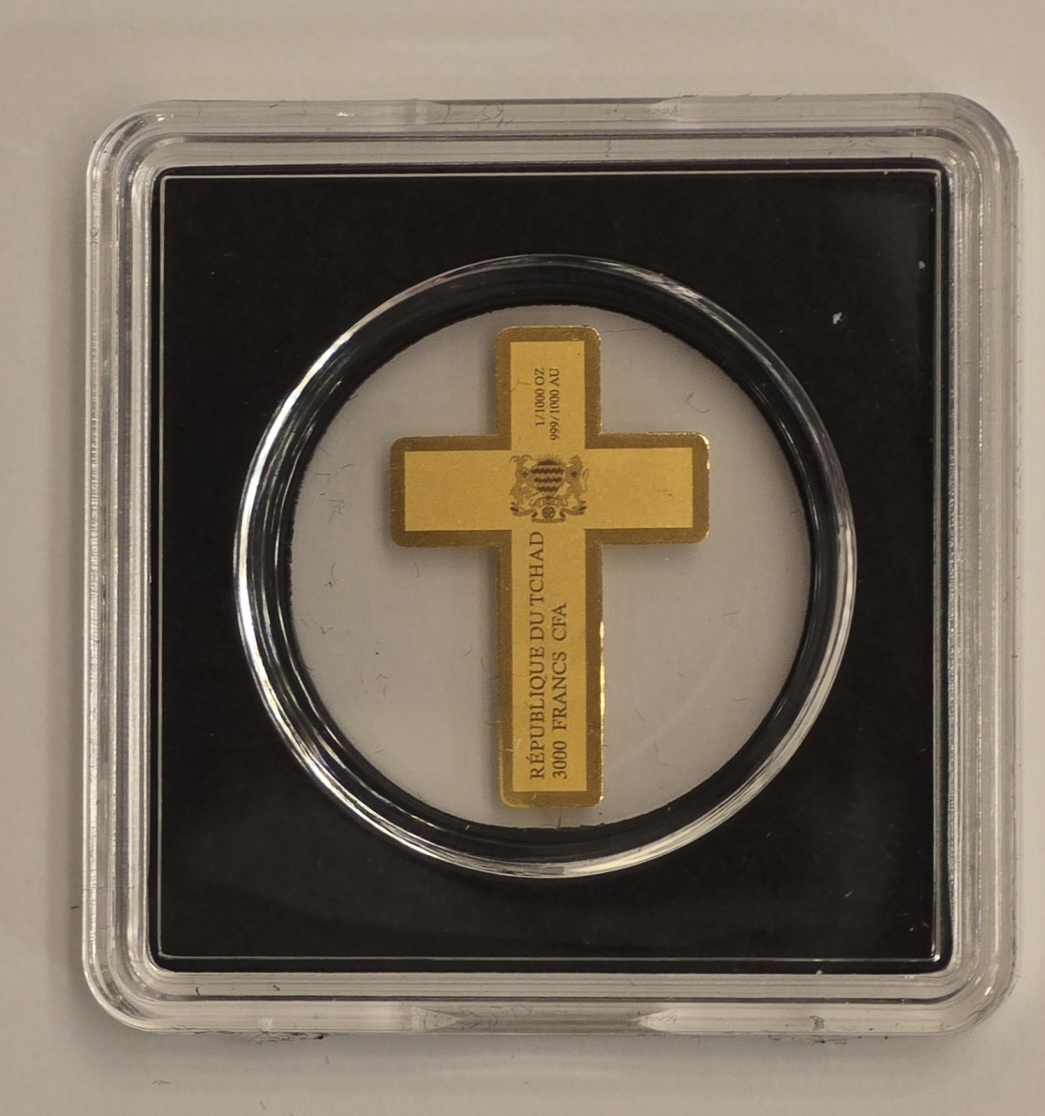 2025 FINE GOLD 1/1000oz CROSS WITH CANDLE/FLAME FROM THE REPUBLIC OF CHAD