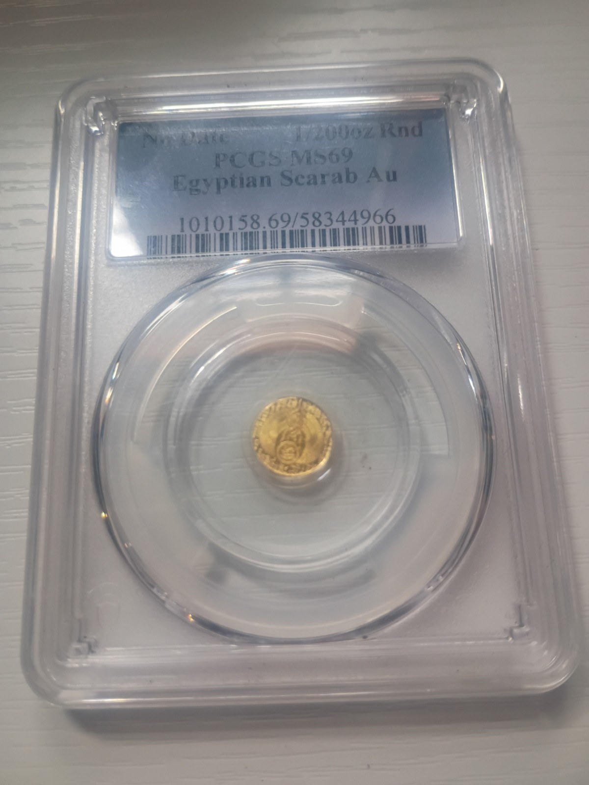 1/200 oz Fine Gold Scarab PCGS Almost Uncirculated 24K Gold Round