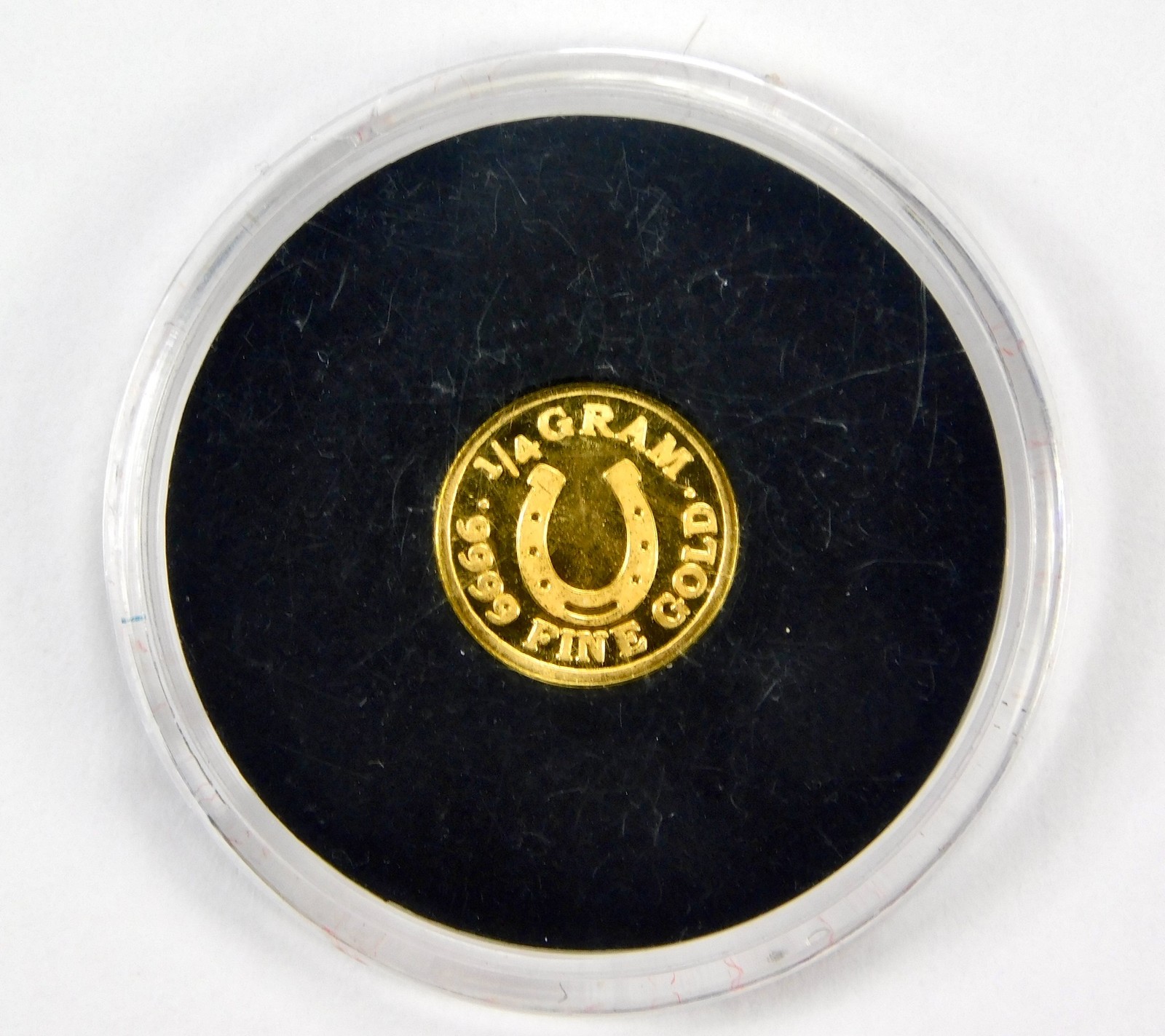 Monarch Precious Metals 1/4 Gram .9999 Fine Gold Lucky Horseshoe Round B