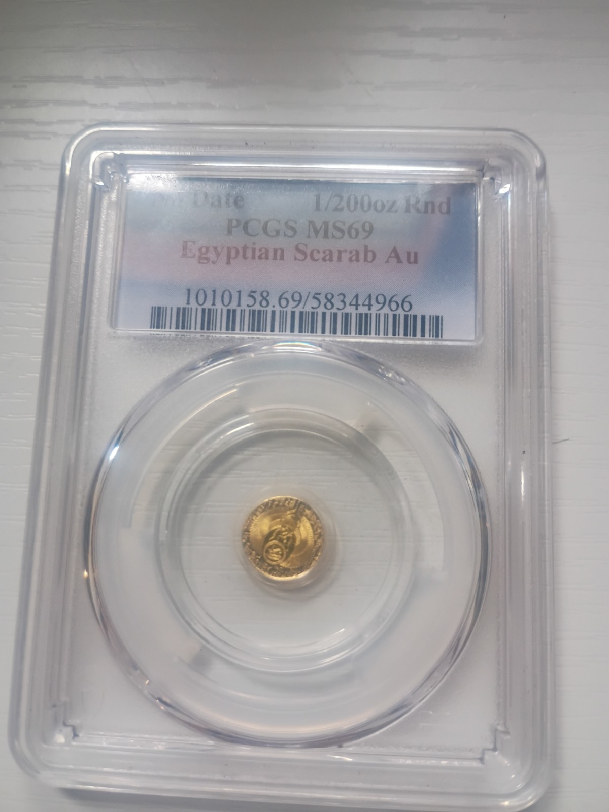 1/200 oz Fine Gold Scarab PCGS Almost Uncirculated 24K Gold Round