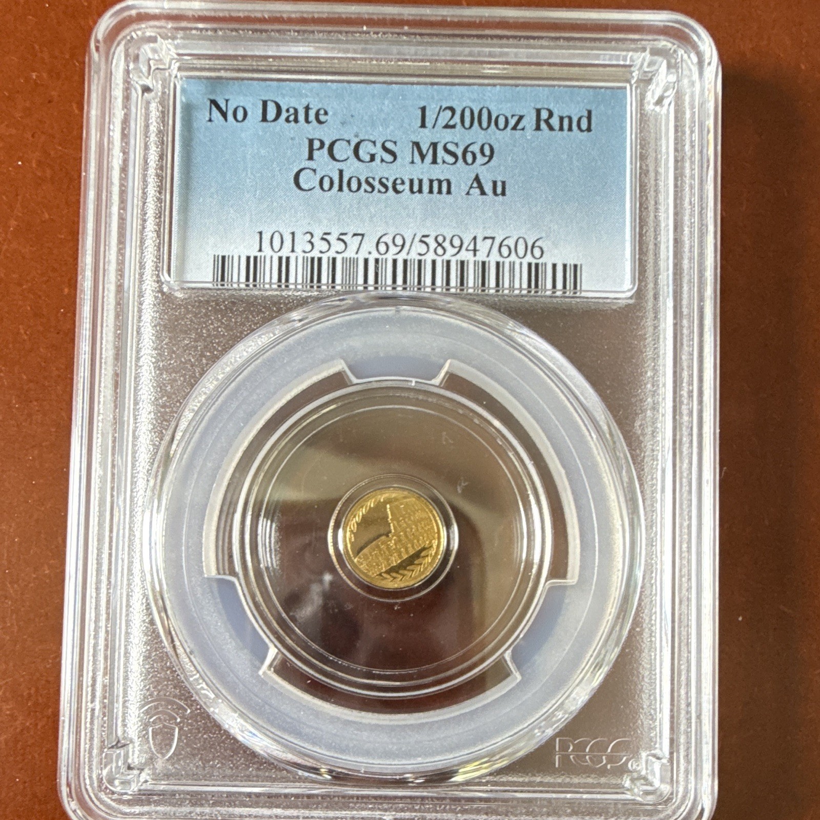 PCGS MS69 Colosseum ND 1/200 oz Gold Round Total Gold Content