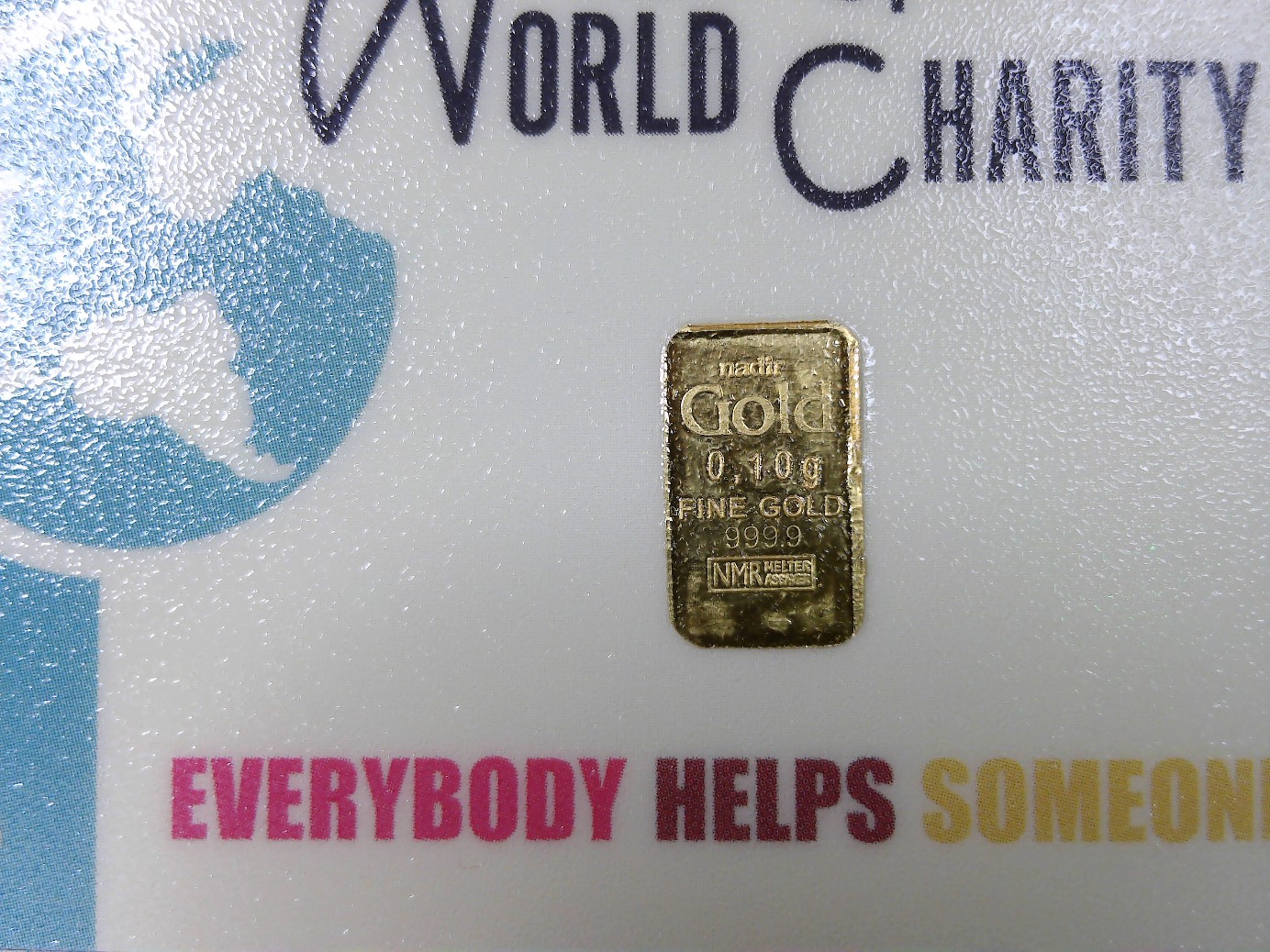Nadir Gold Bar 1/10th gram gold bar World of Charity .999 GOLD!