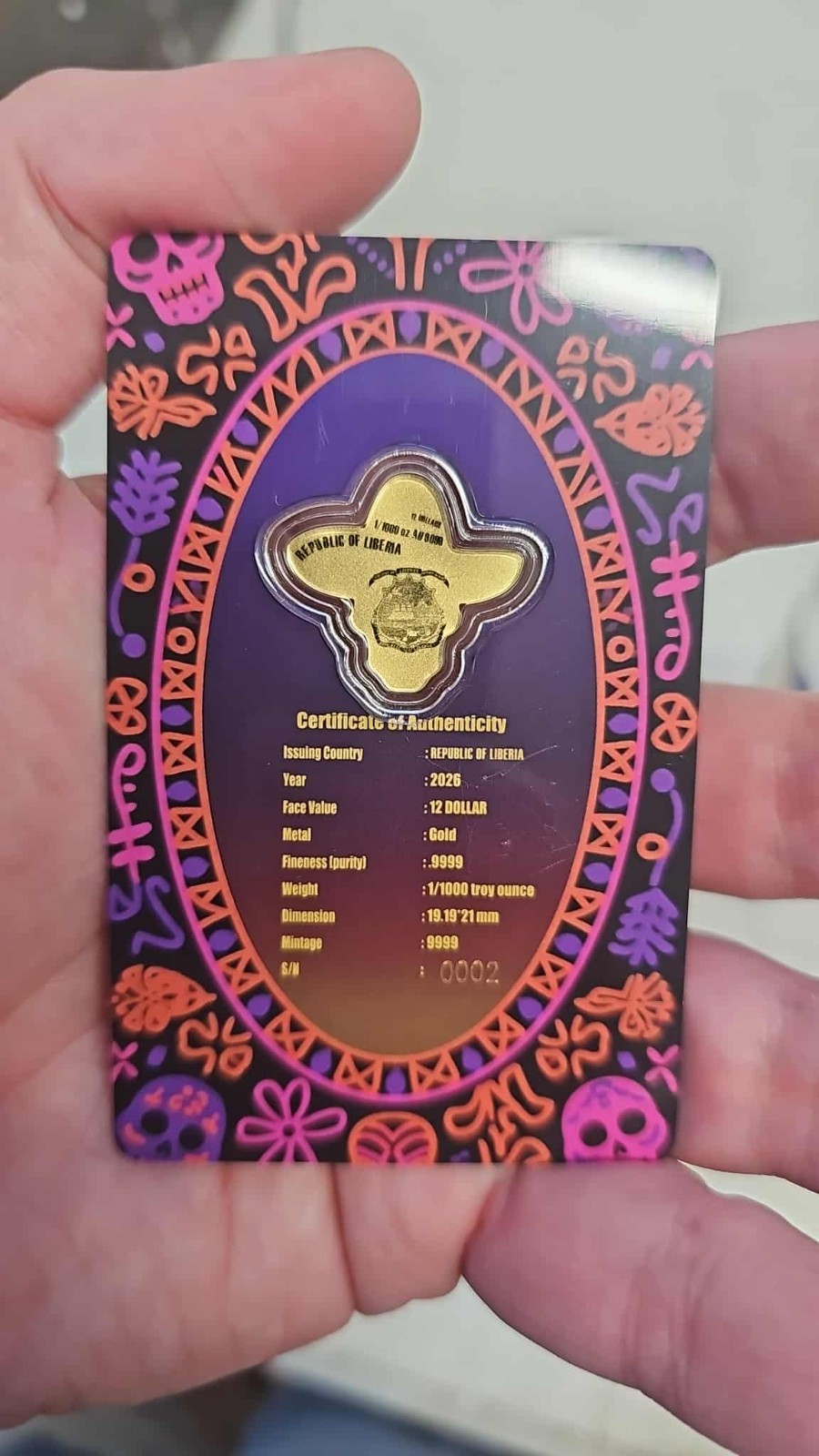 2026 Liberia 1/1000th Gold Carded Dia De Los Muertos Special Shaped with Capsule