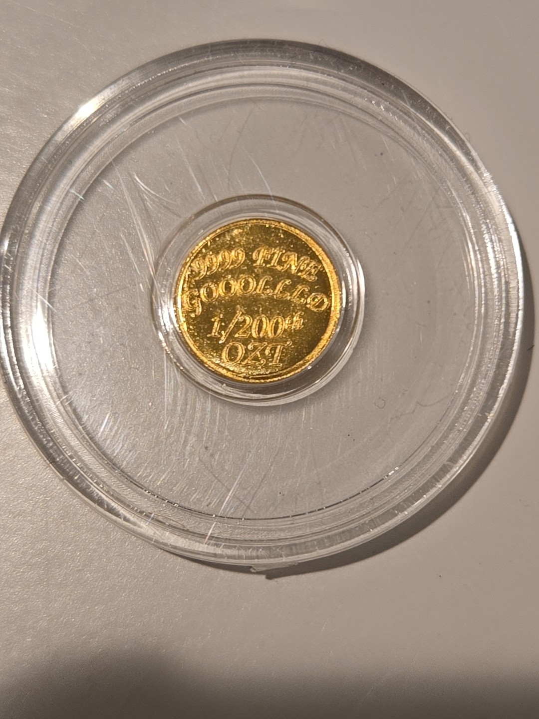 The Coin Shack 1/200th oz .9999 Fine Gold Round In Plastic Capsule