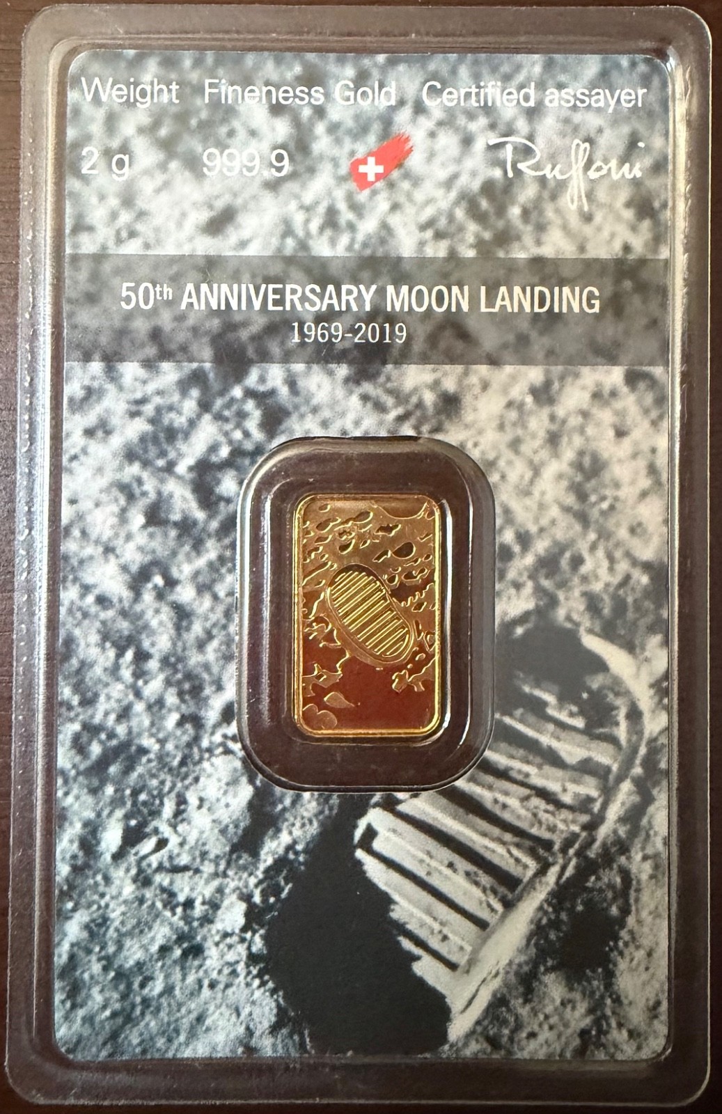 2G 999.9 Gold Argor-Heraeous Moon Landing Bar in Assay