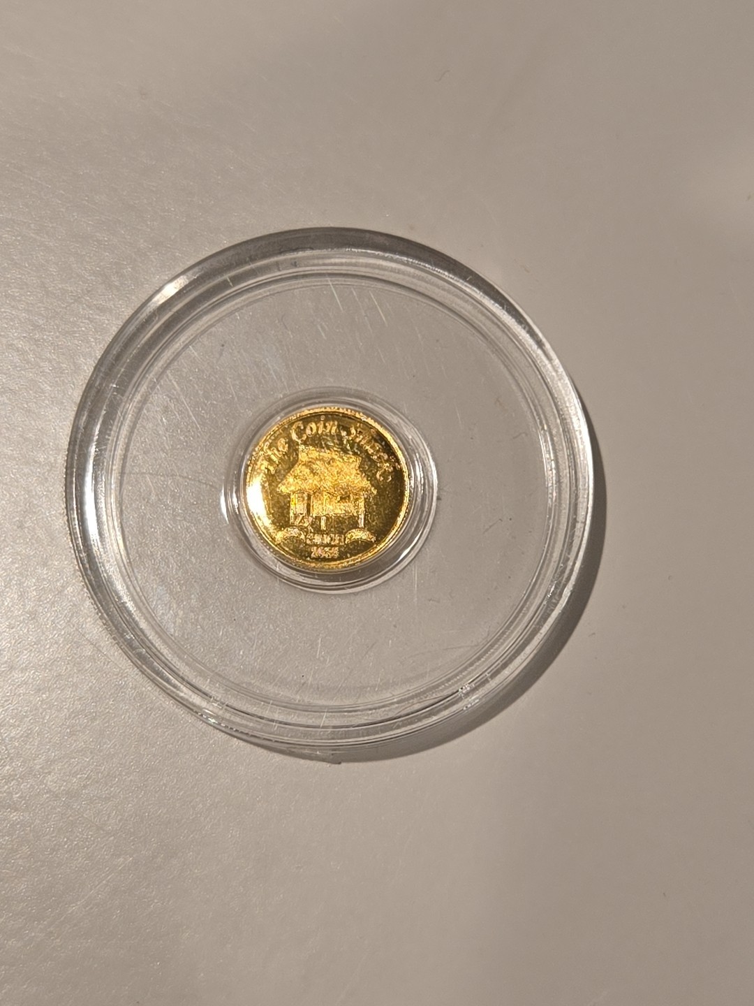 The Coin Shack 1/200th oz .9999 Fine Gold Round In Plastic Capsule