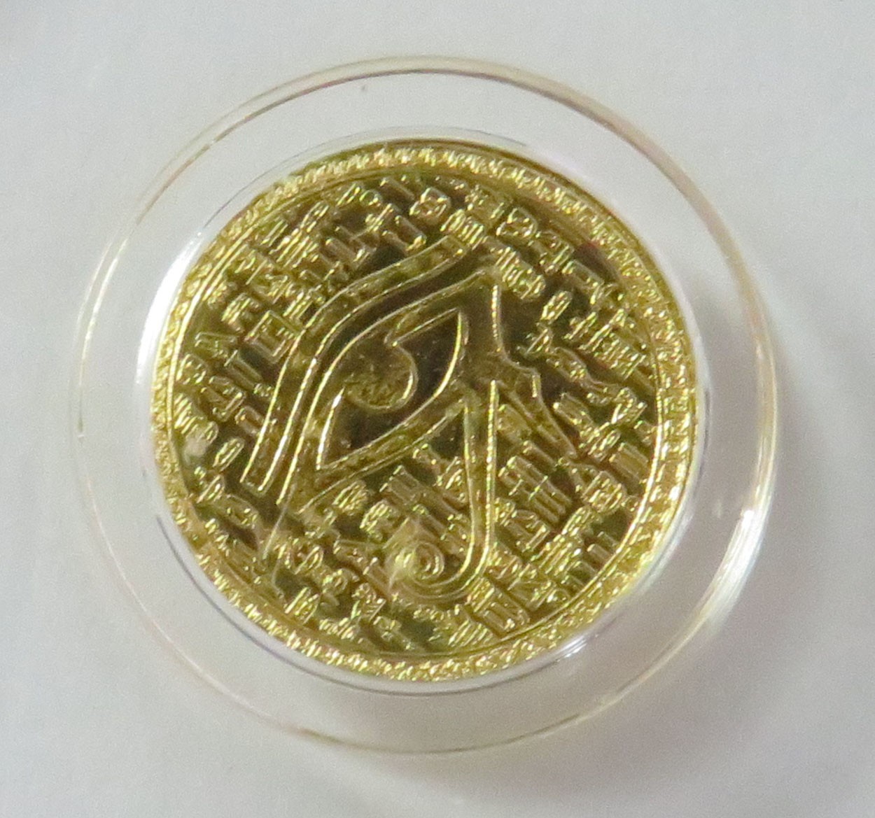 EYE OF RA GOLD 1/500oz 9999 FINE ROUND ICG MS 70