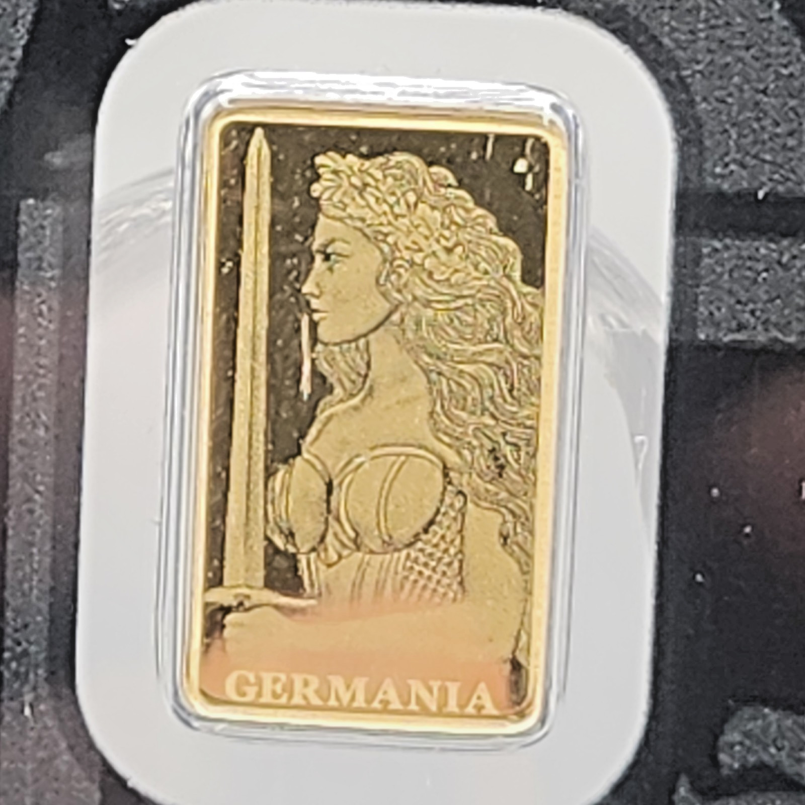 Germania Mint 1/200oz Gold Lady Germania Proof Bar W/ Safepack Assay Card