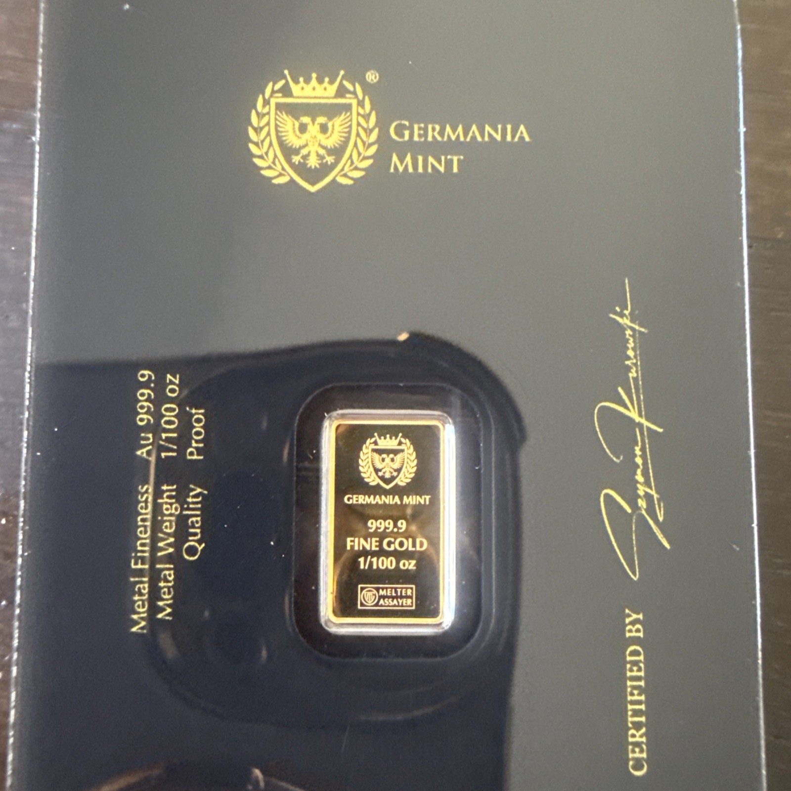 1/100 Germania Mint Gold Bar (New w/ Assay)