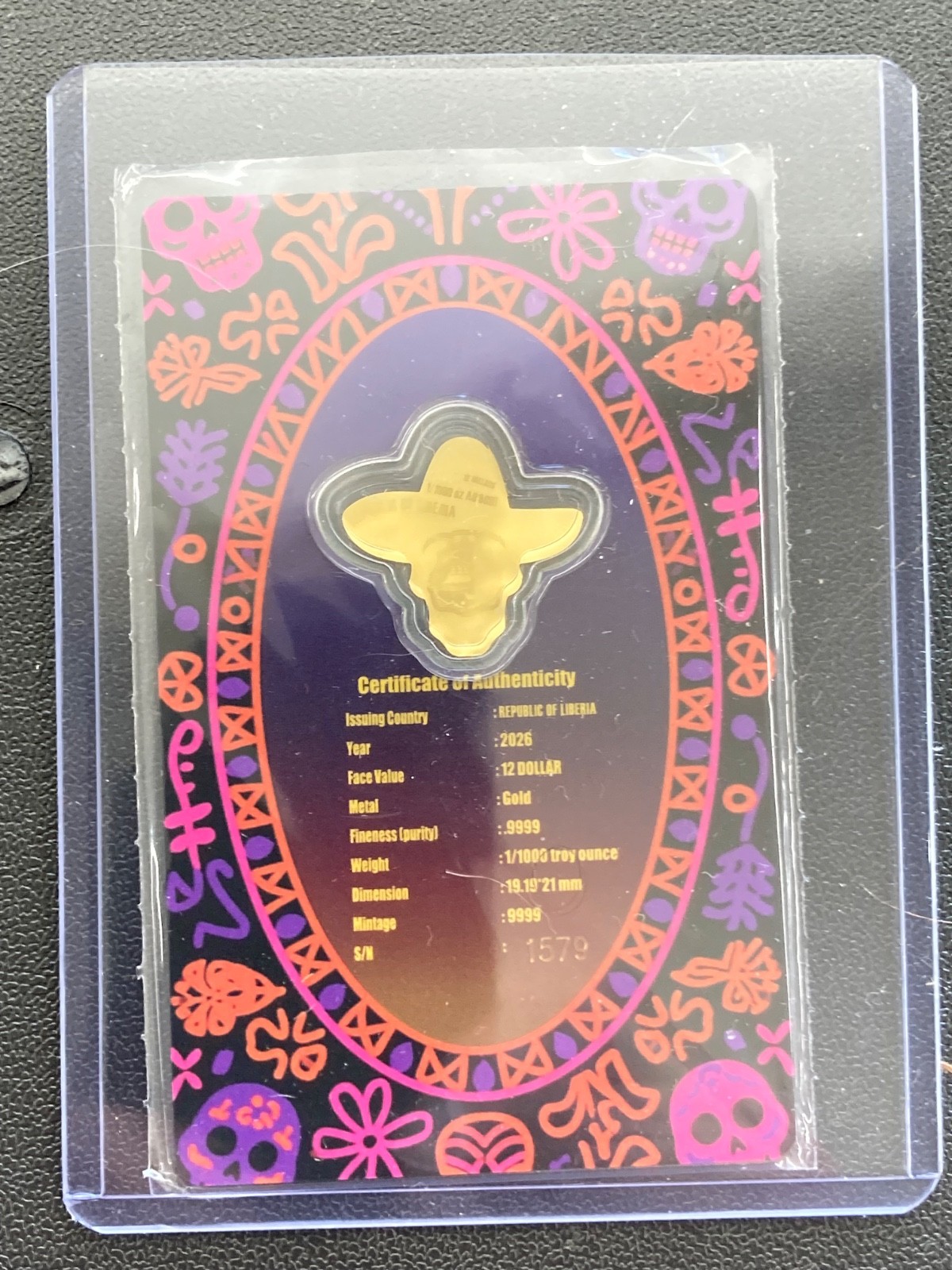 2026 Liberia 1/1000th Gold Carded Dia De Los Muertos Special Shaped with Capsule