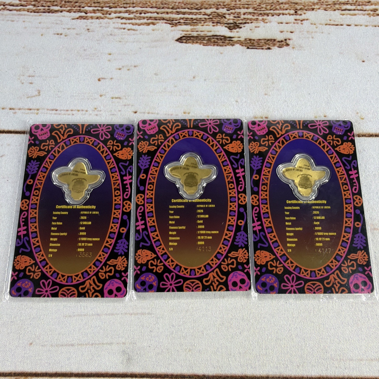 2026 Liberia 1/1000th Gold Carded Dia De Los Muertos Special Shaped with Capsule