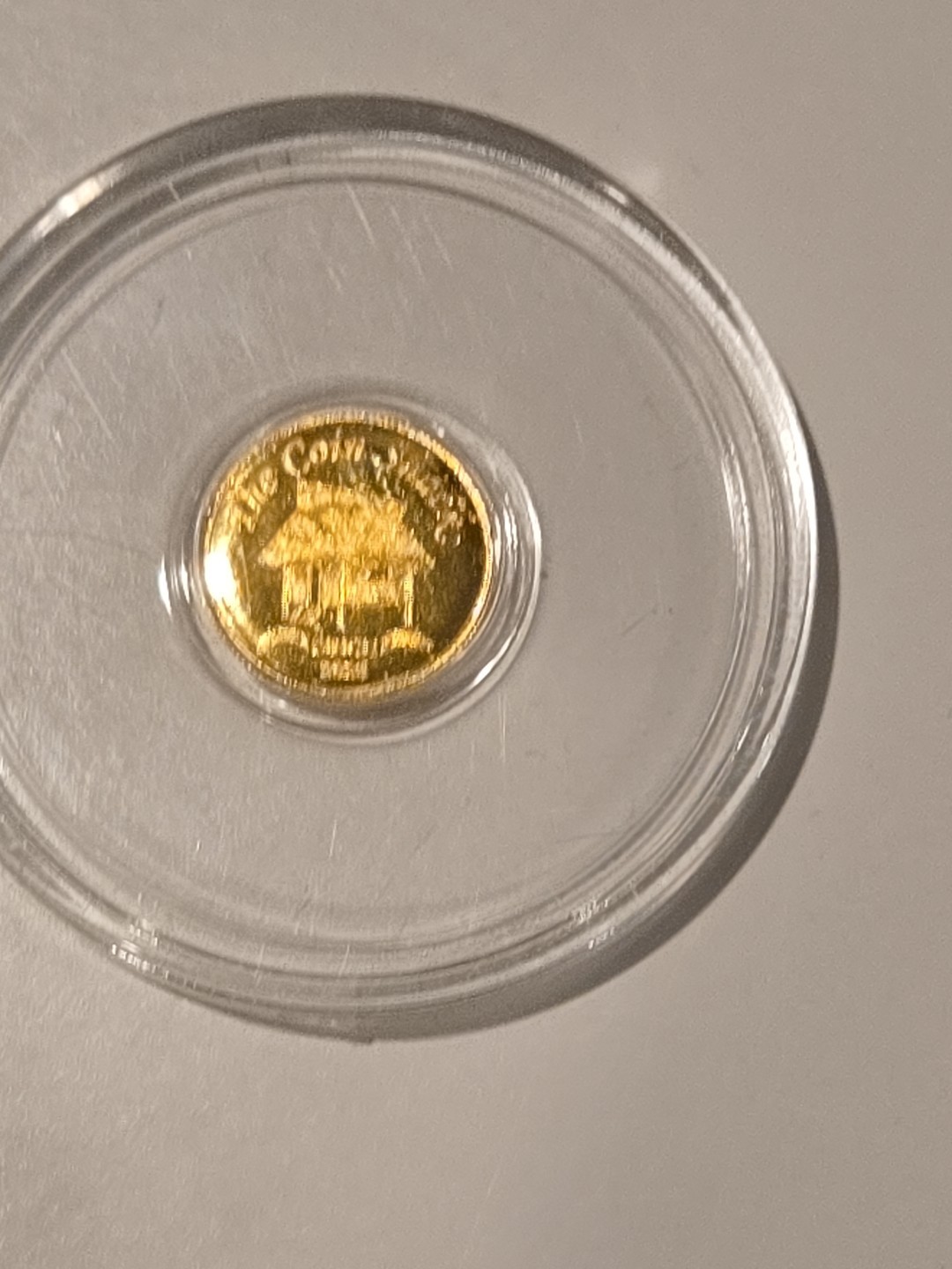 The Coin Shack 1/200th oz .9999 Fine Gold Round In Plastic Capsule