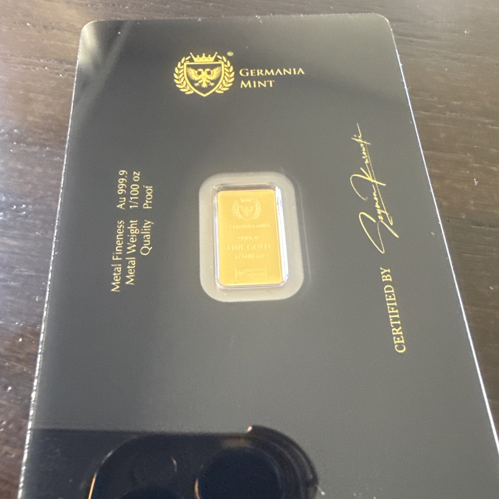 1/100 Germania Mint Gold Bar (New w/ Assay)