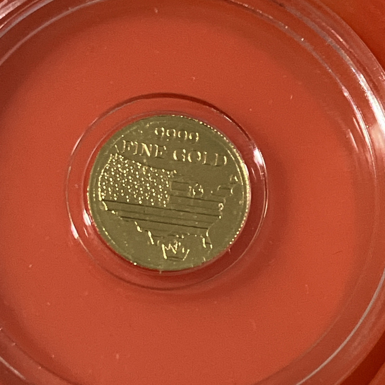 1/100 oz .9999 Fine Gold Round American Eagle & Flag in Clear Capsule – Monarch