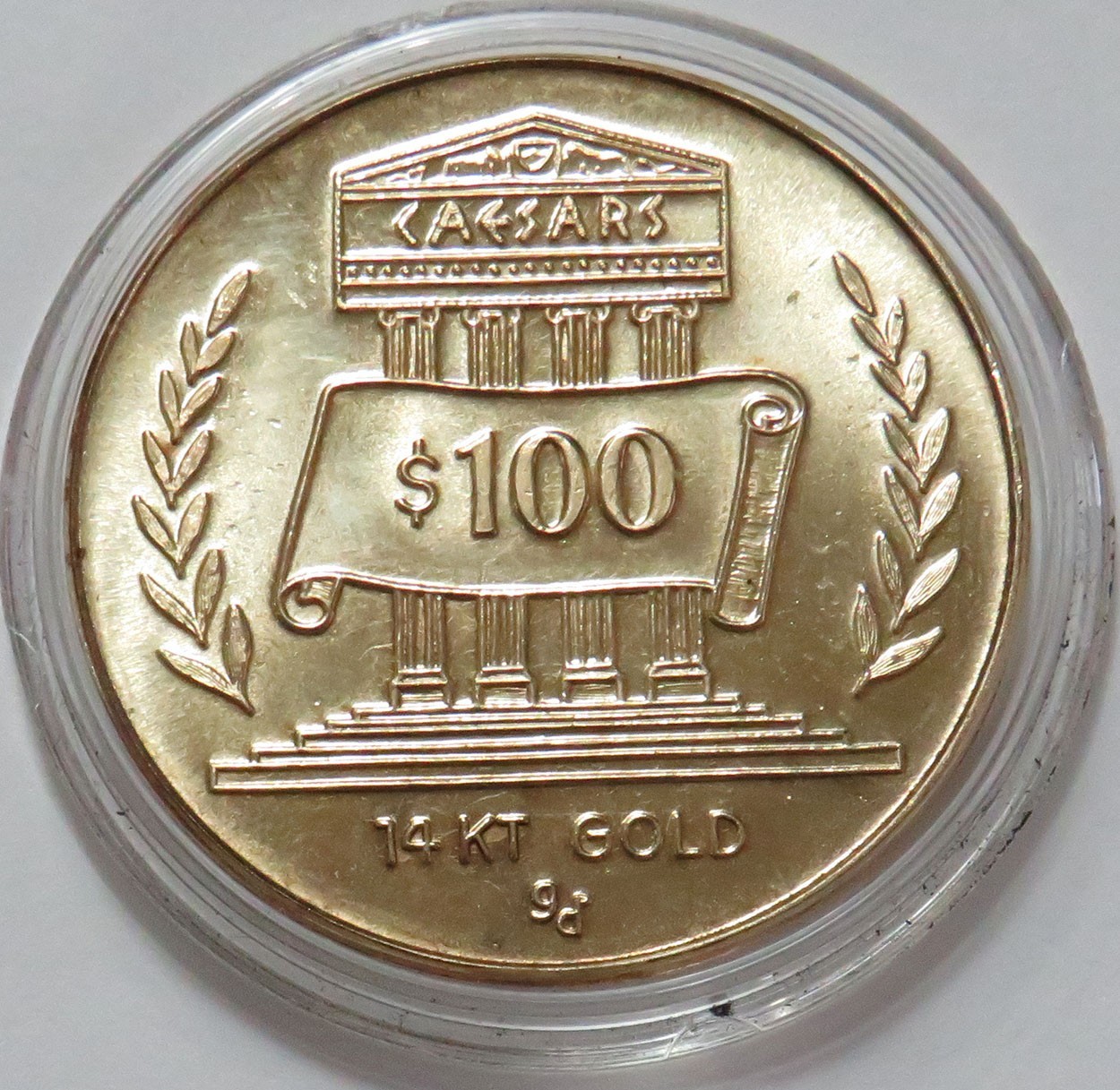 CAESARS 14K GOLD $100 CASINO GAMING TOKEN 11.2 GRAMS IN CAPSULE